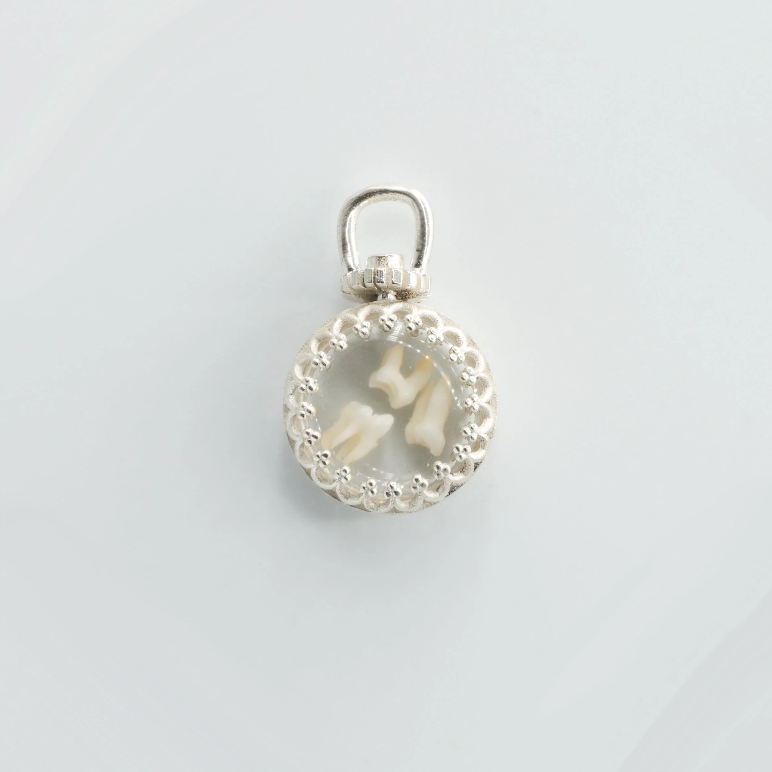 Squirrel Tooth Locket (1 of 2).jpg (Copy)