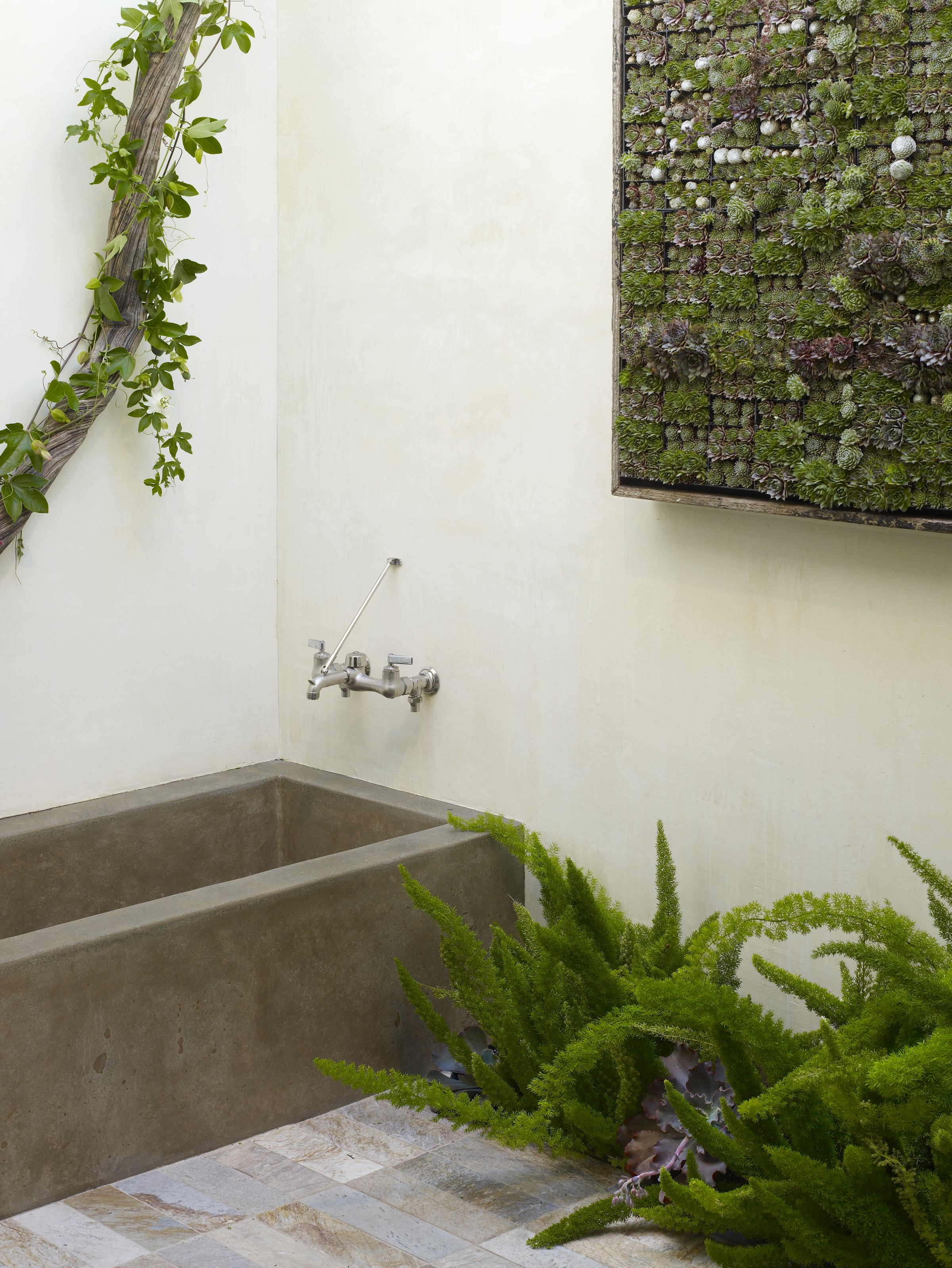 Our small but oh so deep soaking tub was formed in placed by concrete works .