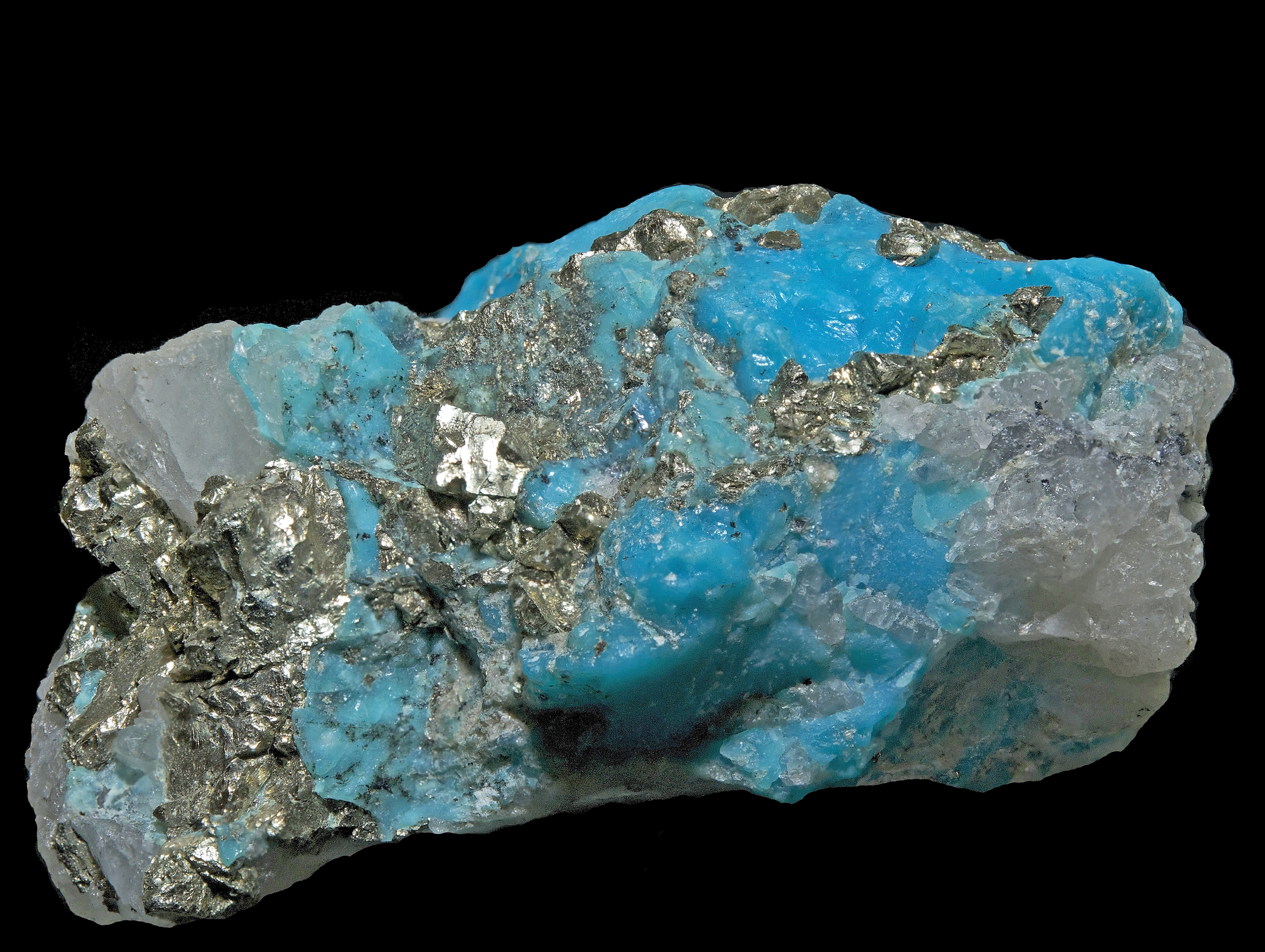 Turquoise with pyrite and quartz. Sleeping beauty mine, Arizona.