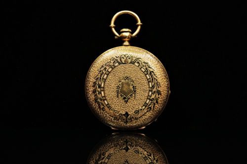Antique 14K yellow gold and enamel pocket watch. Source.