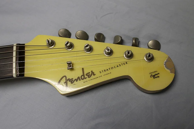 This 1985 Olympic White Stratocaster included a rare feature - a matching (yellowed out) headstock.
