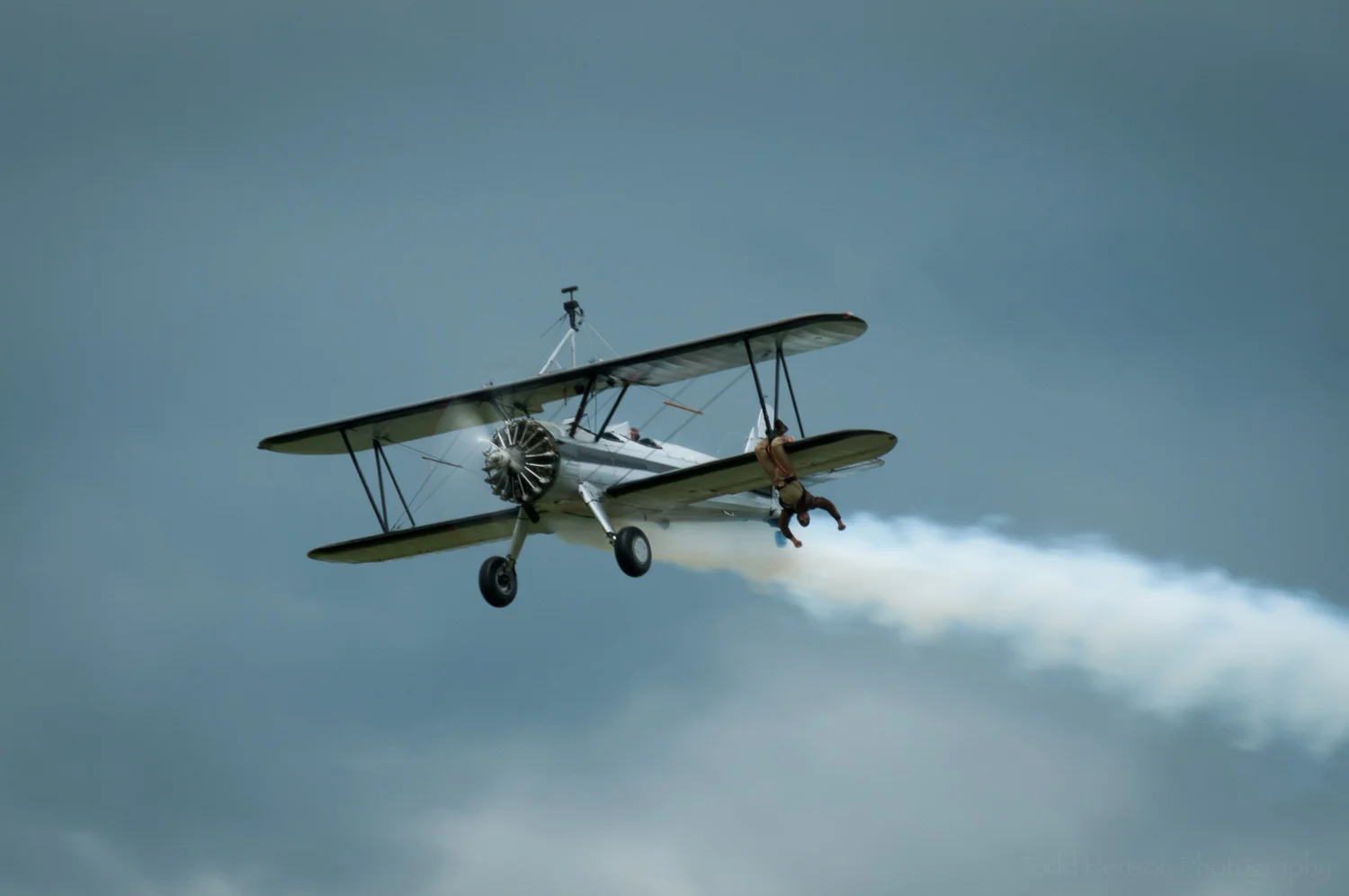 Hanging On. Pilot: Chuck Tippett. Wing Walker: Joe Bender. Camera settings: 400mm, 1/80 sec, f/20