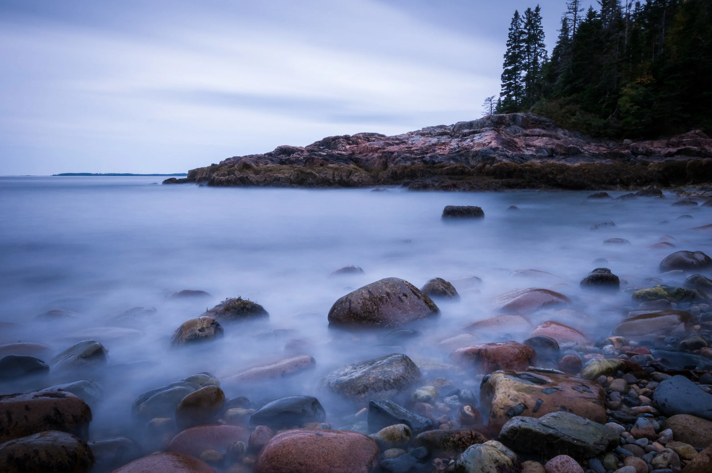 Long exposure of a rocky shoreline in Acadia National Park, Maine (cooler tones)