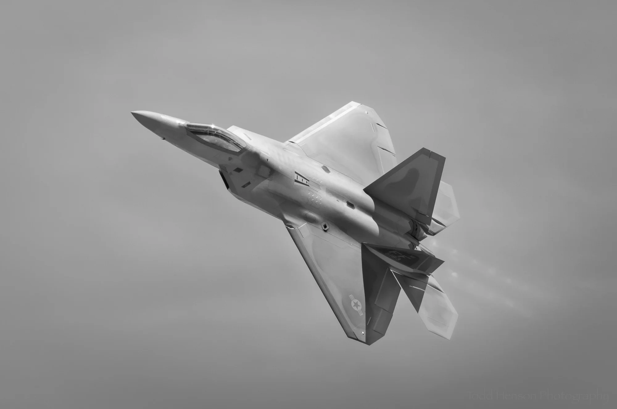 Raptor Flyby #2: USAF F-22 Raptor angled upward.