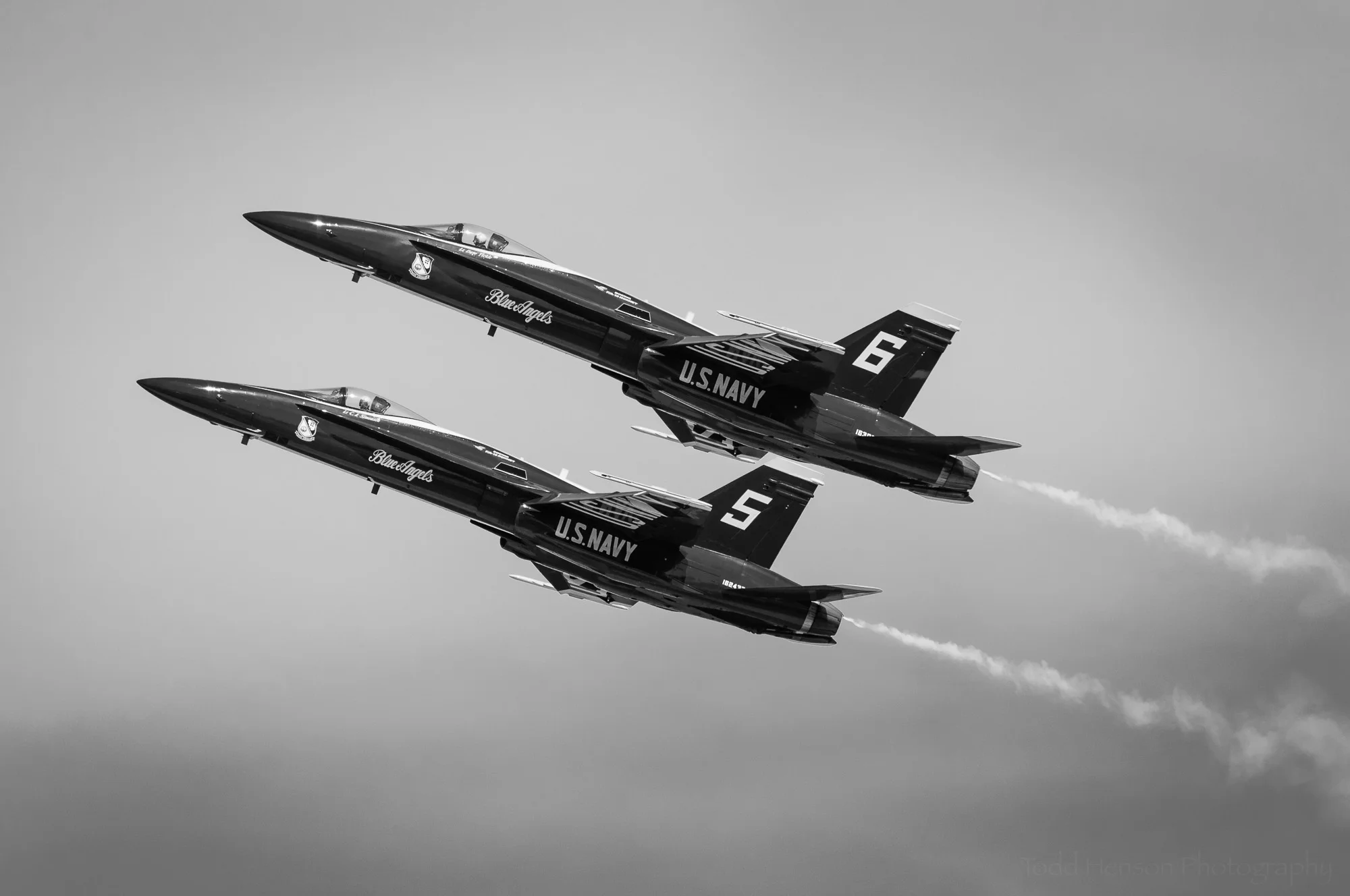 Blue Angels Flyby #4: A pair of USN F/A-18 Hornets flying in formation.