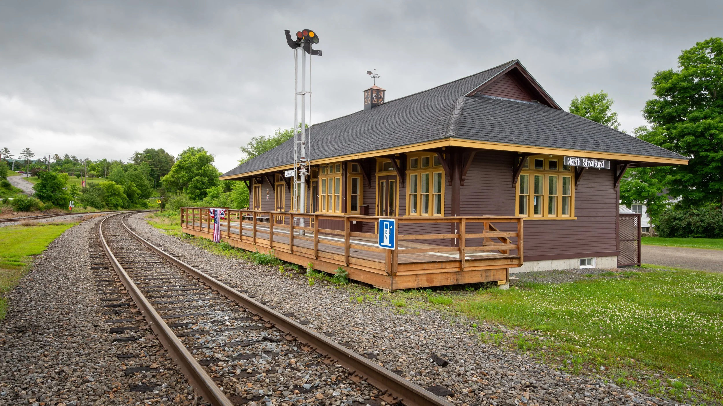 The Stratford Public Library beside the rails