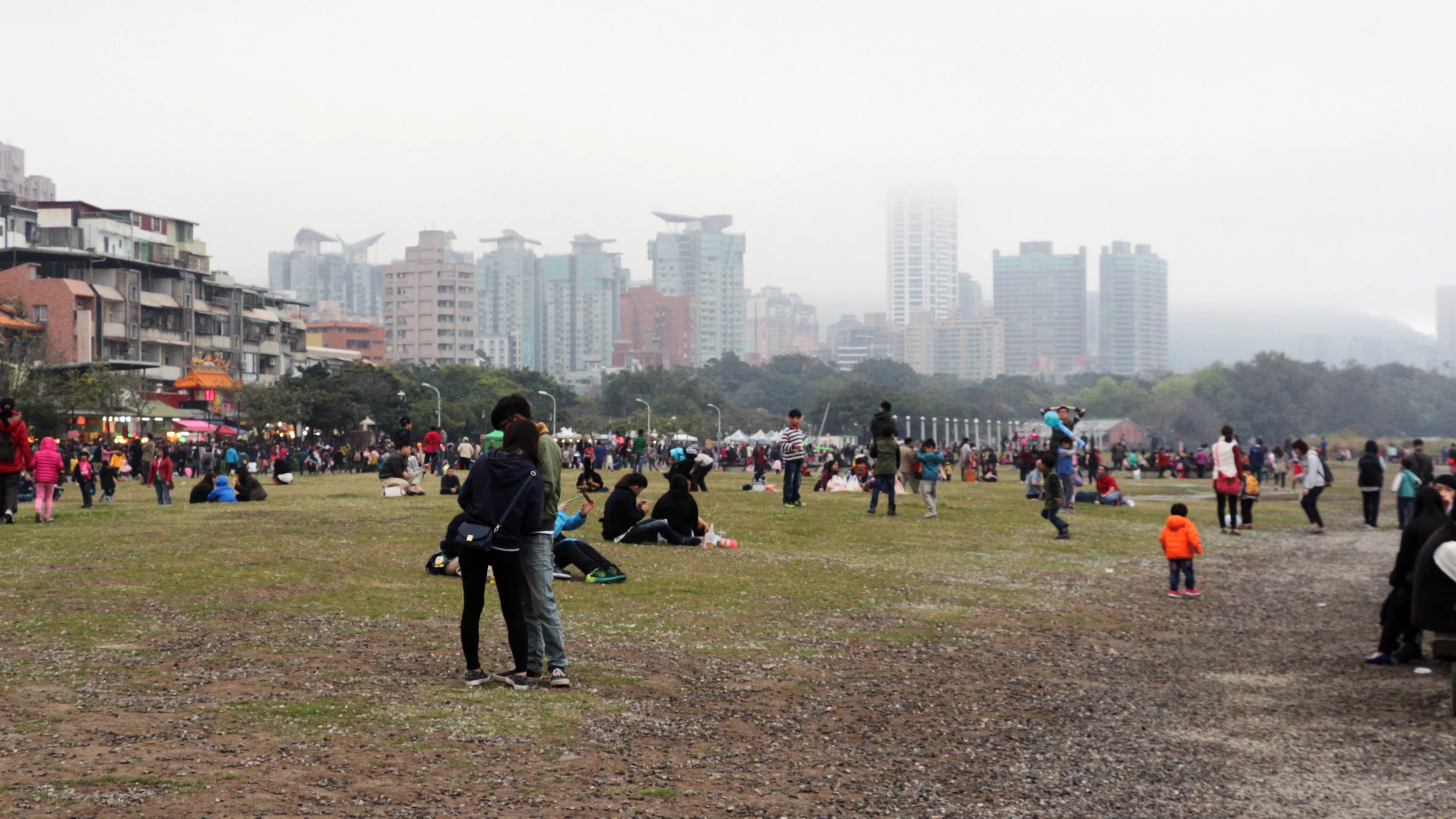 The river bank also has a park area where couples, families, and friends enjoy and relax. It was a bit cloudy that day but there were still plenty of people out and about. 