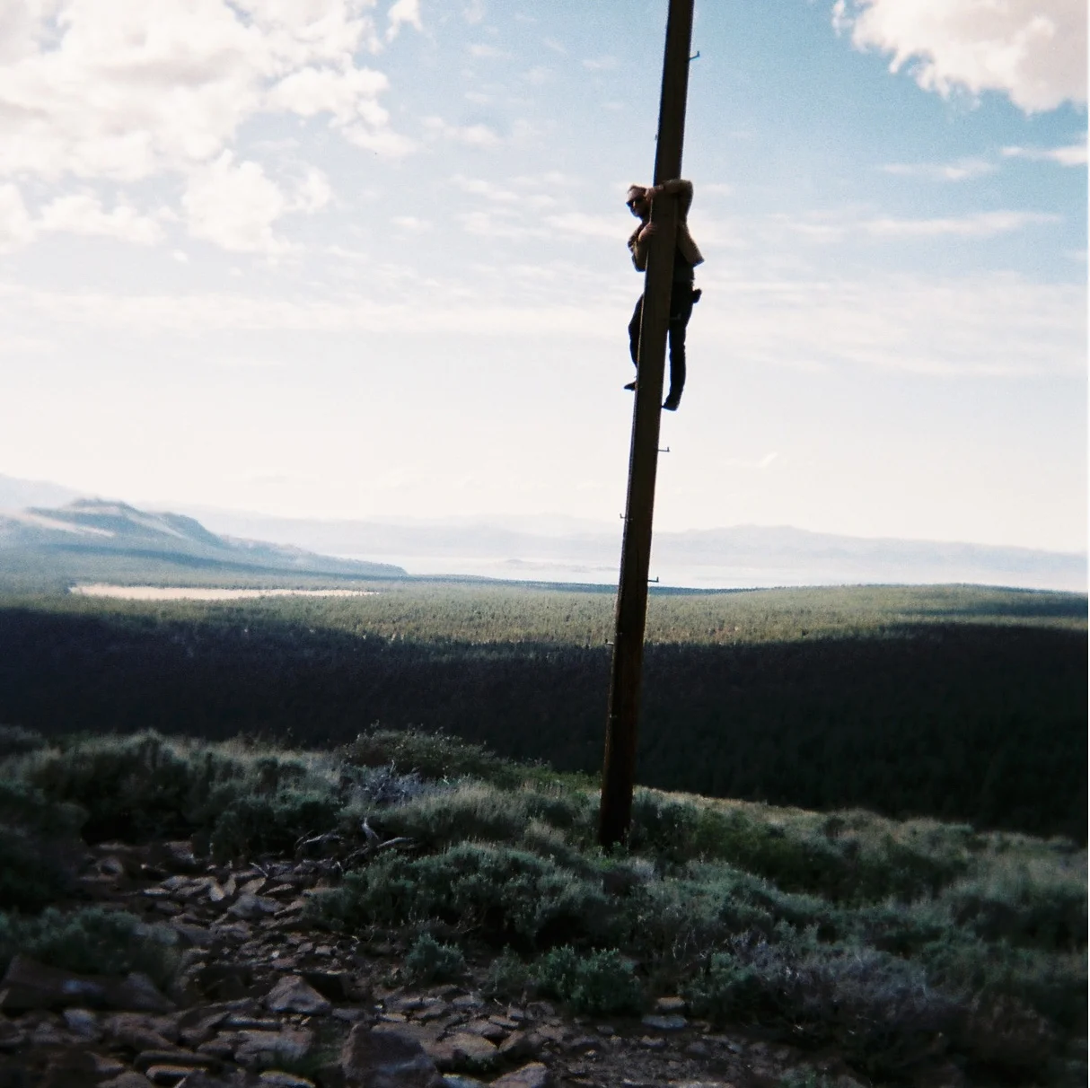 I climbed a pole. Mono lake in the background.