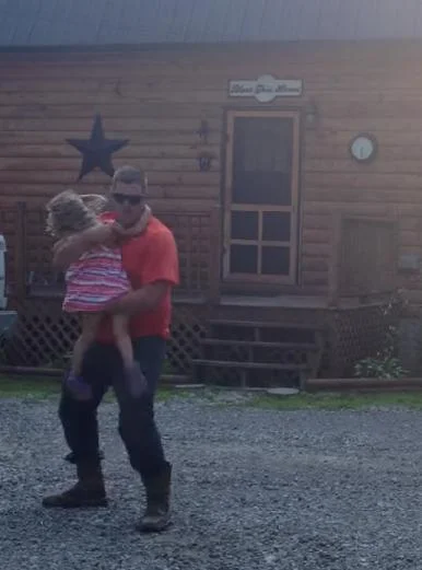 Daddy and Daughter dancing after Dad gets Home from Work 