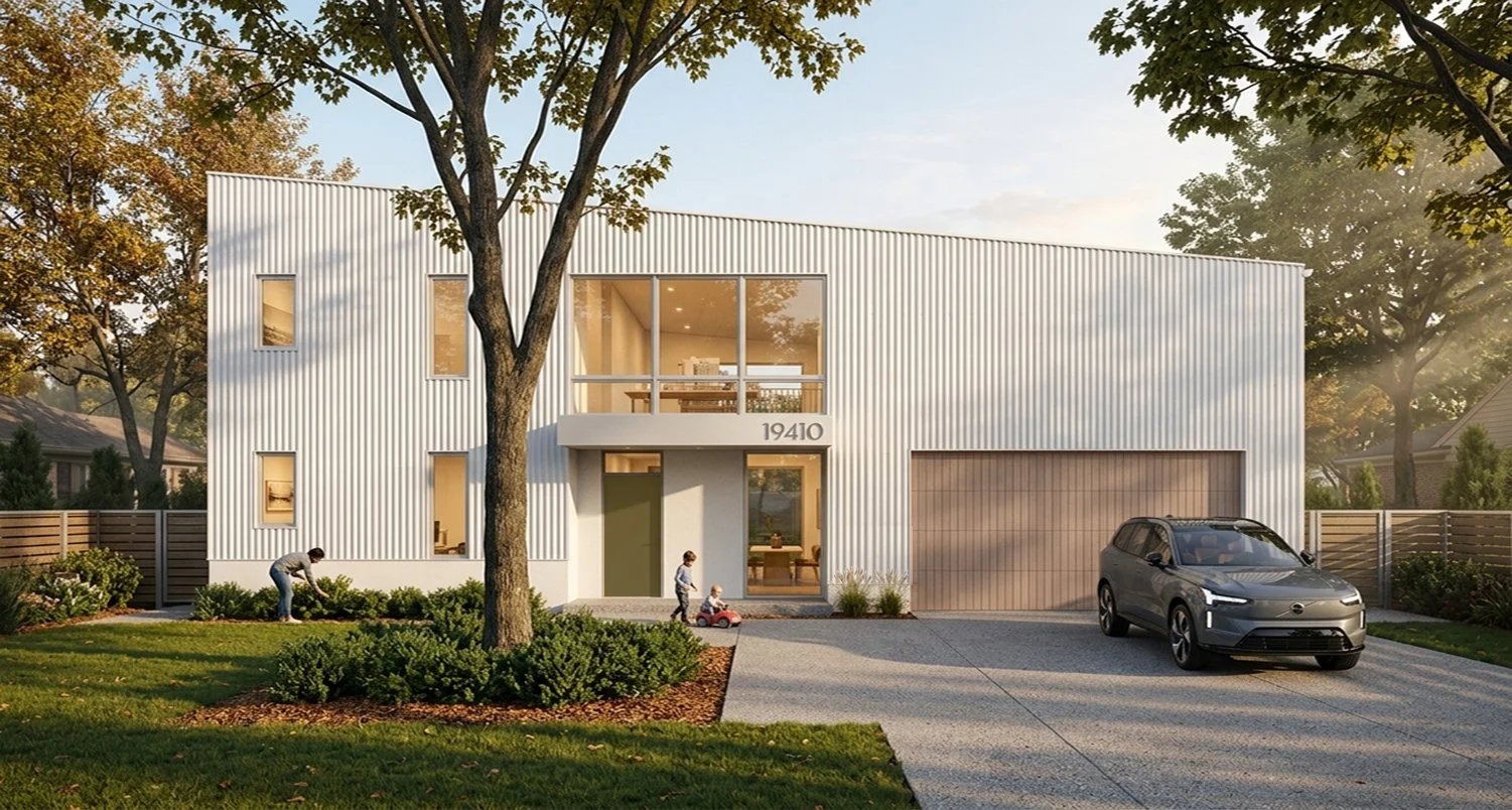 A 2-story, white corrugated metal eco-house situated on a residential street in Royal Oak, Michigan, featuring Structural Insulated Panels from Insulspan.com, insulated windows, and roof top solar panels.