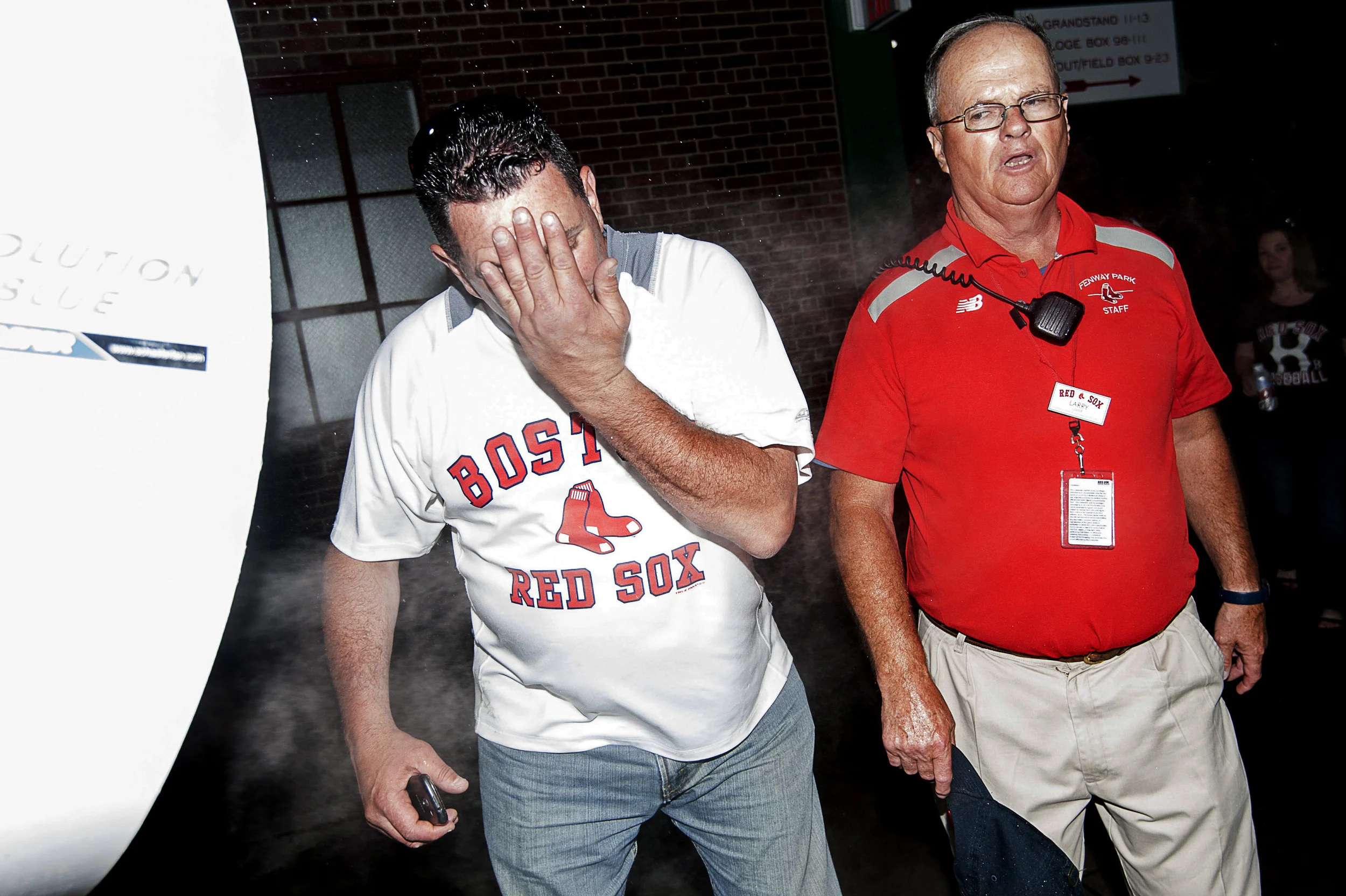  Fans try to cool off during the Boston Red Sox vs. Baltimore Orioles game on Wednesday, June 24, 2015 at Fenway Park in Boston, Mass. 