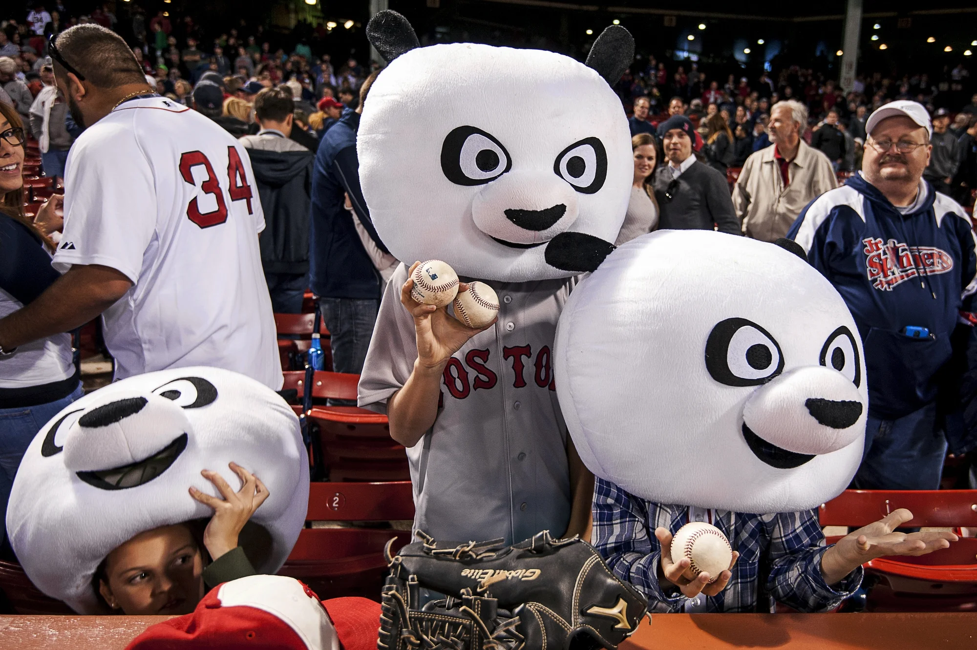  Siblings Sadie, 11, Mack, 13, and Tatum, 8, Lemaku, of Bedford, NY, show off their panda suits after the Boston Red Sox vs. Los Angeles Angels game on Saturday, May 22, 2015 at Fenway Park in Boston, Mass.The Red Sox won 8-3. 