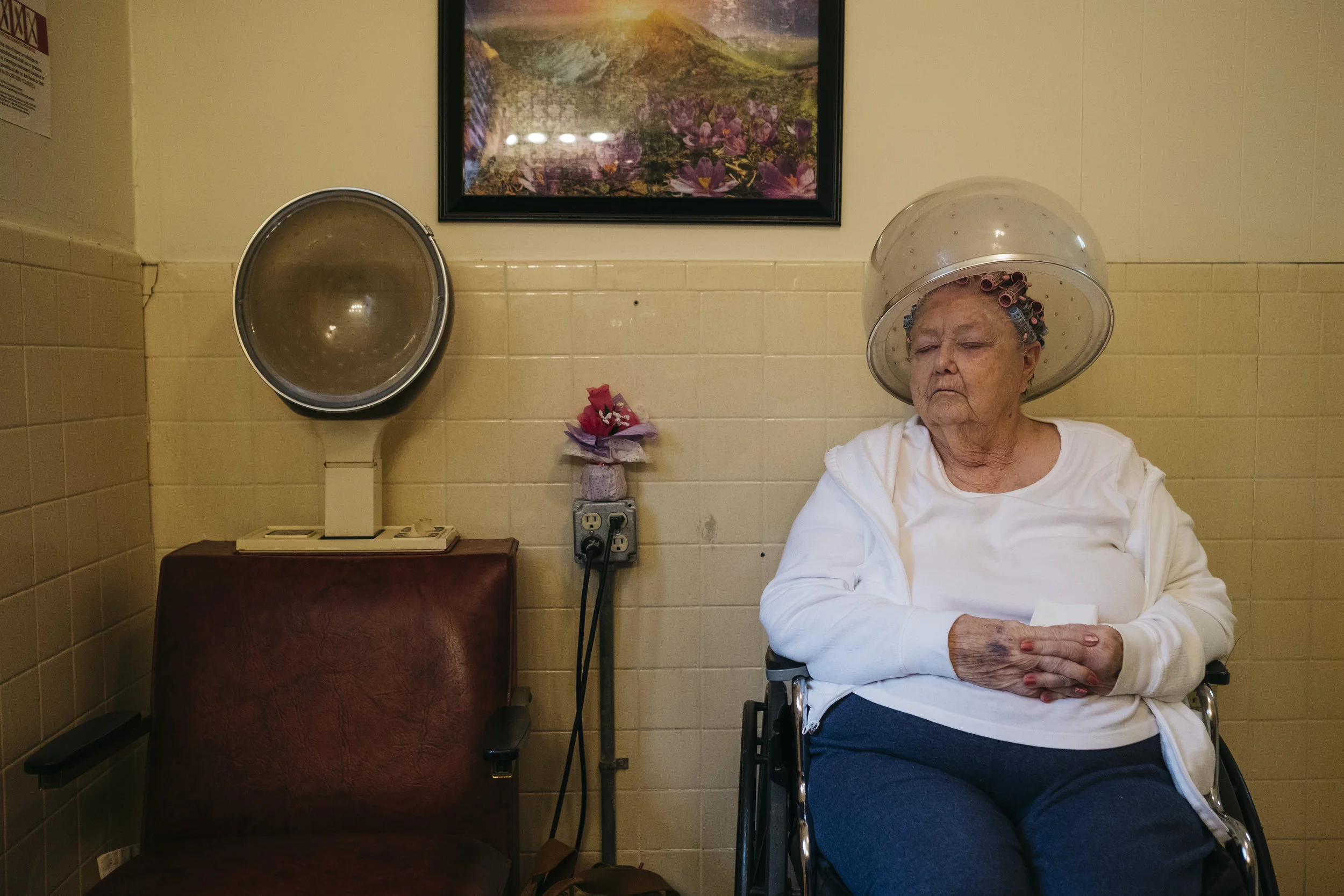  Helen Estes, 89, sits under the dryer while getting a perm on Tuesday, June 18, 2019 at King's Daughters Home in Mexico, Mo. Hairdressers come to the home twice a week.   