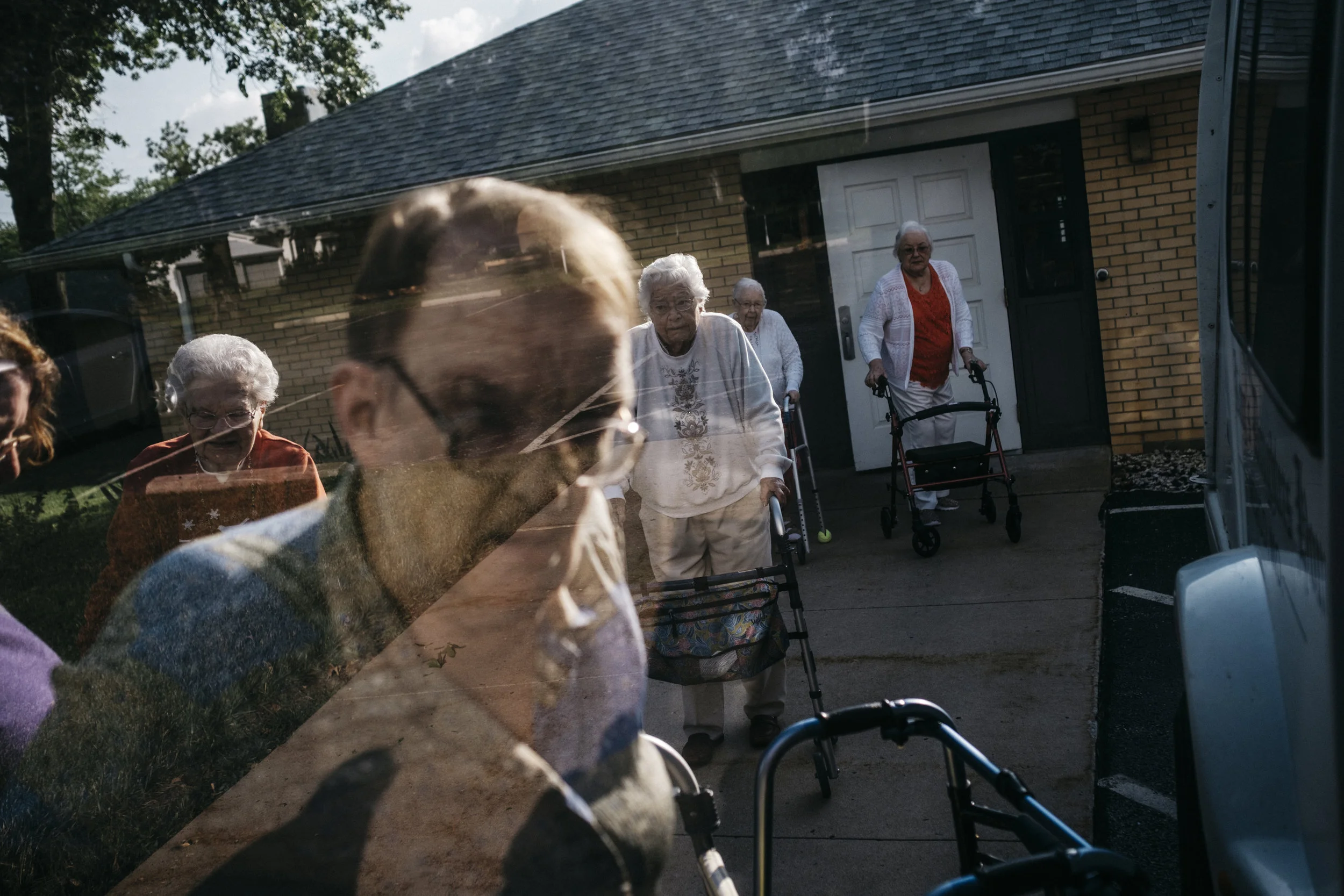  Residents board the bus before going to an outdoor concert downtown on Tuesday, June 18, 2019 at King's Daughters Home in Mexico, Mo. 