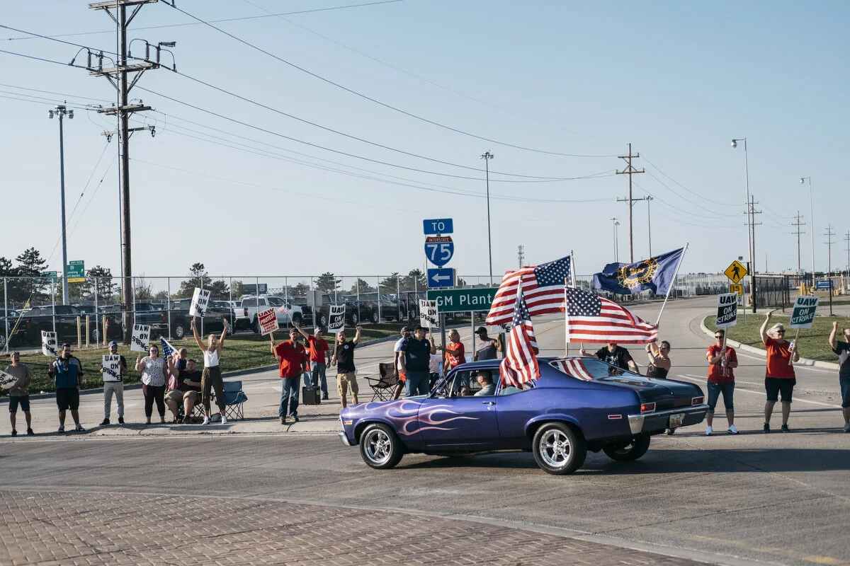  UAW members and supporters picket outside the General Motors Flint Metal Center on Wednesday, Sep. 18, 2019 in Flint, Mich. After the current bargaining contract expired on Saturday, nearly 50,000 UAW General Motors employees across the country walk