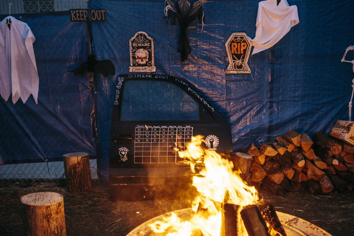  A truck door acts as a strike calendar outside the General Motors Flint Assembly Plant during the 25th day of the strike on Thursday, Oct. 10, 2019 in Flint, Mich.  
