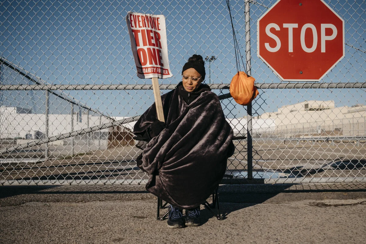  GM employee LaTonia Alexander, 50, of Chesterfield Township pickets outside the Flint Assembly Plant on Wednesday, Oct. 23, 2019 in Flint, Mich. UAW Local 598 voted for the new contract today. Alexander has been working at GM for 11 years and voted 