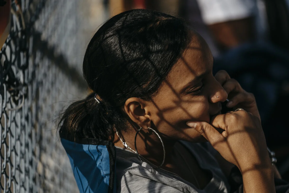 General Motors temporary employee of two months Sharron Stephenson, 34, of Ypsilanti talks on the phone while picketing outside the General Motors Flint Assembly Plant during the 25th day of the strike on Thursday, Oct. 10, 2019 in Flint, Mich.    