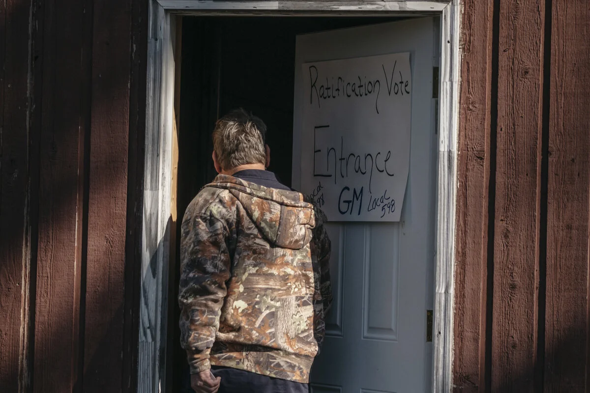  A UAW Local 598 member enters to vote on the new General Motors contract on Wednesday, Oct. 23, 2019 at the Union City Fields in Flint, Mich.  