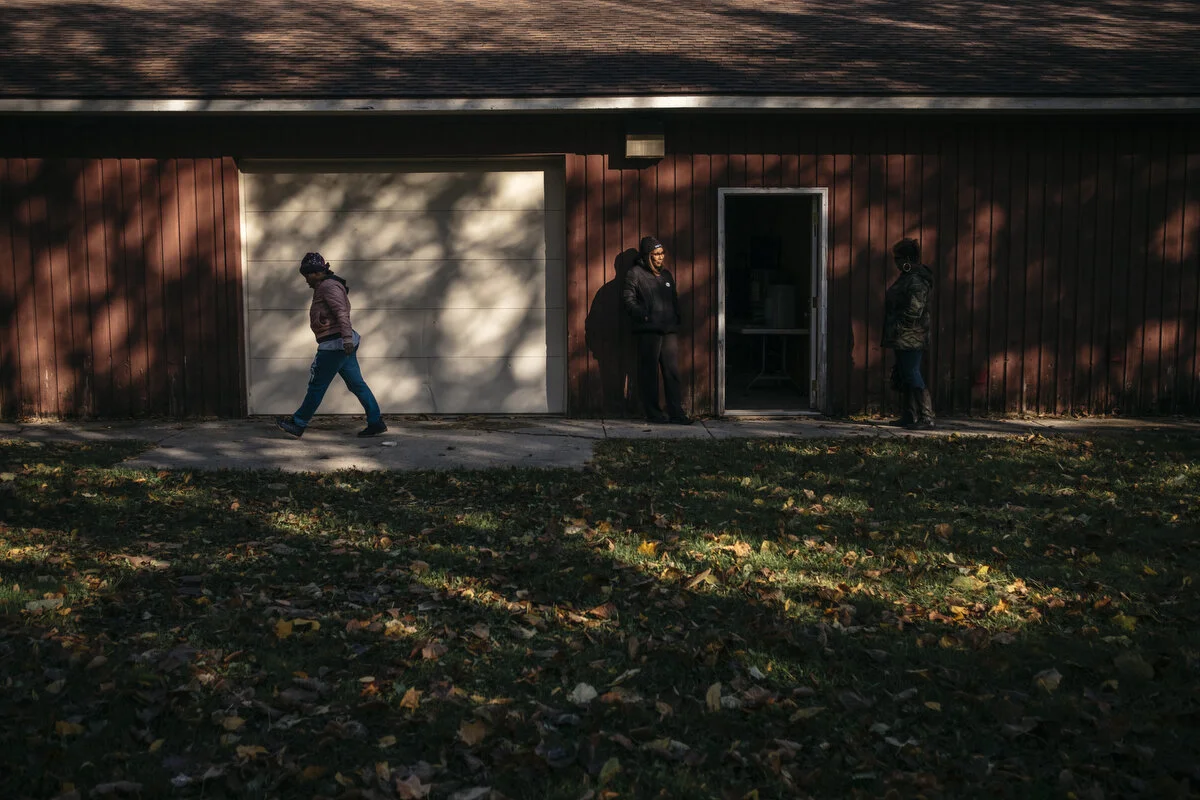  UAW Local 598 members leave after voting on the new General Motors contract on Wednesday, Oct. 23, 2019 at the Union City Fields in Flint, Mich.  