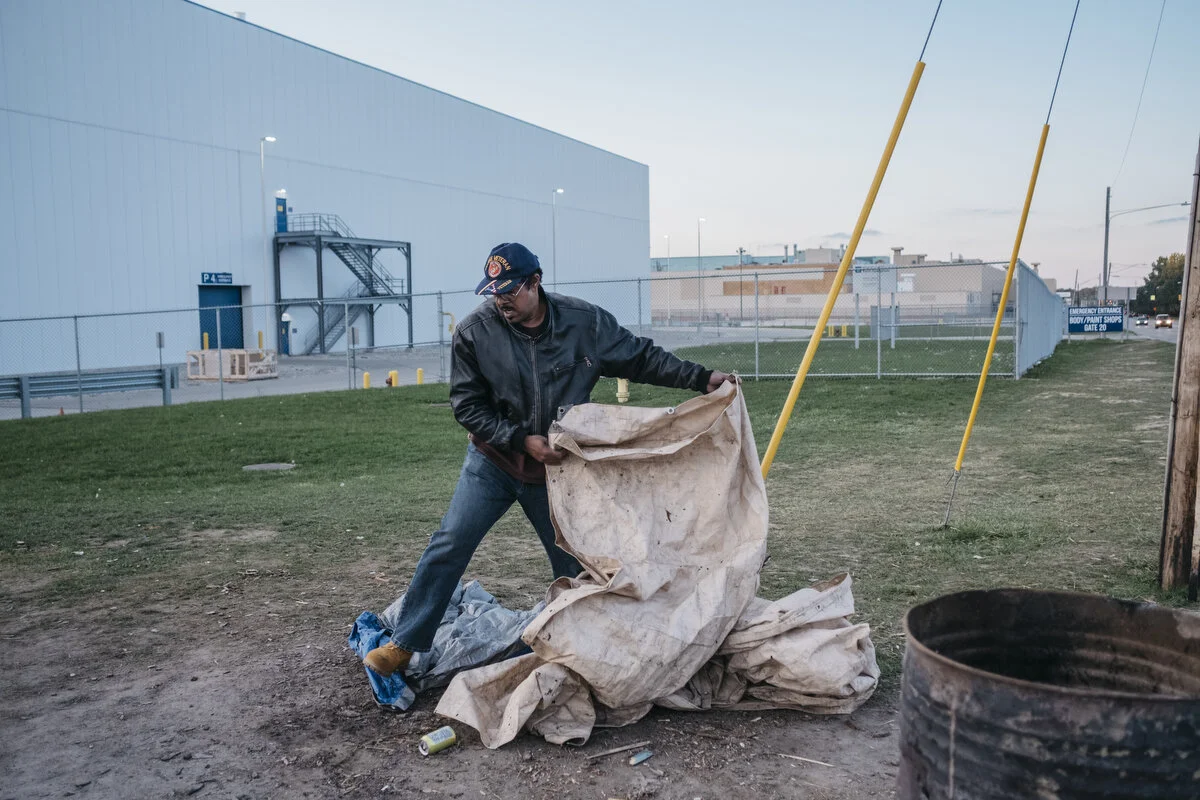  General Motors employee of 19 years Huey Harris, 59, cleans up after the strike outside the Flint Engine Operations Plant on Friday, Oct. 25, 2019 in Flint, Mich. Harris transferred from Lordstown in February and his wife still lives in Ohio. Harris