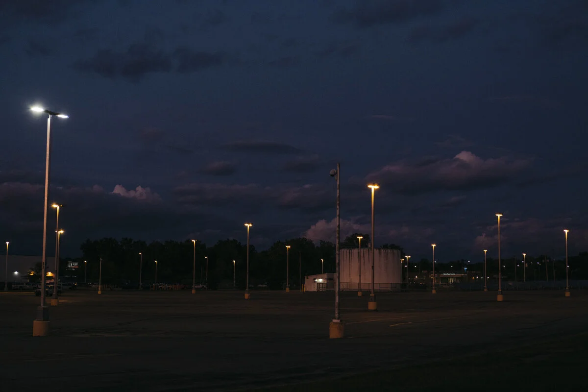  The sun sets on a parking lot outside the General Motors Flint Engine Operations Plant during the eighth day of the strike on Monday, Sep. 23, 2019 in Flint, Mich. 