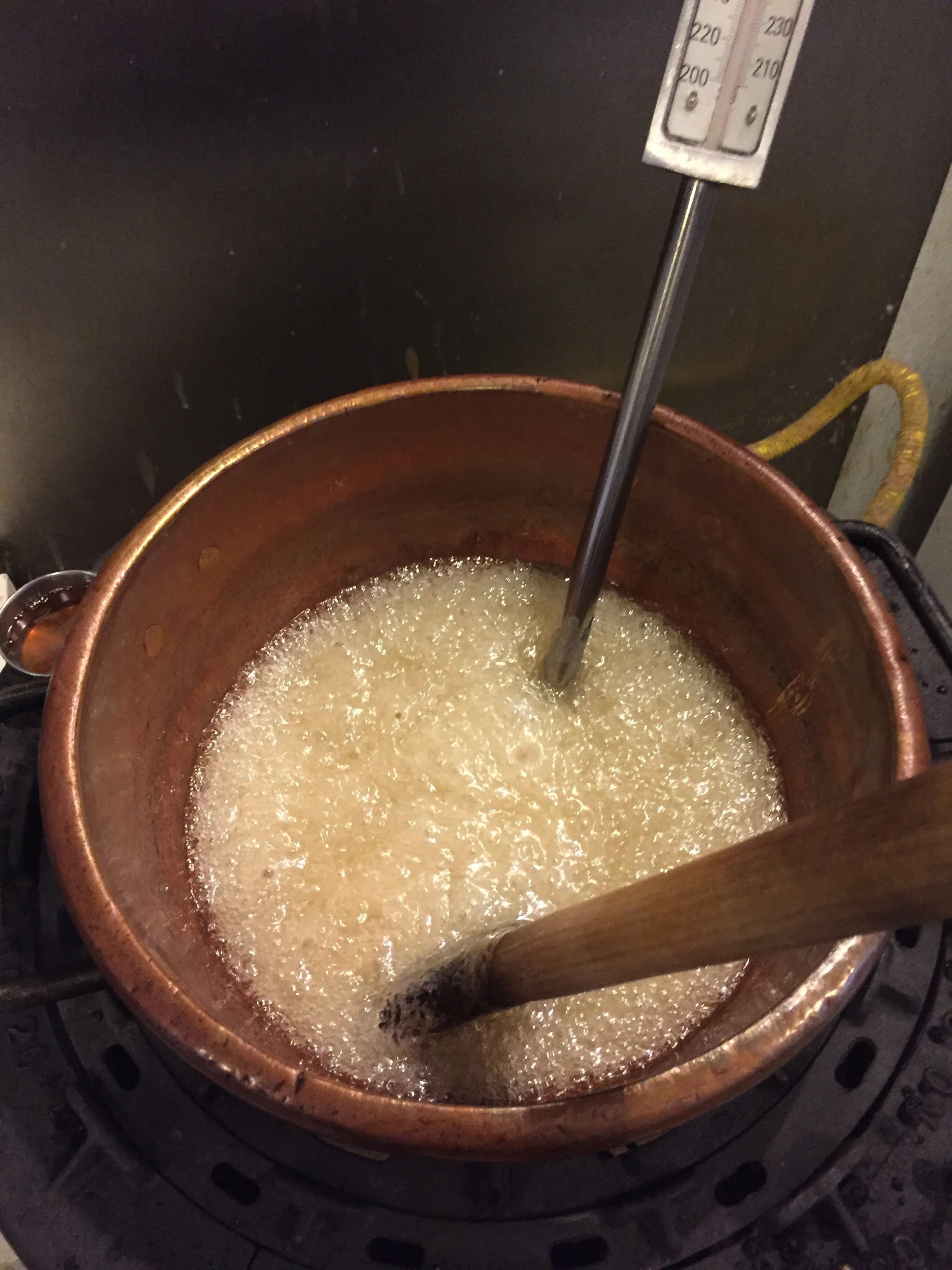 Cooking a batch of peanut brittle - vintage copper kettles