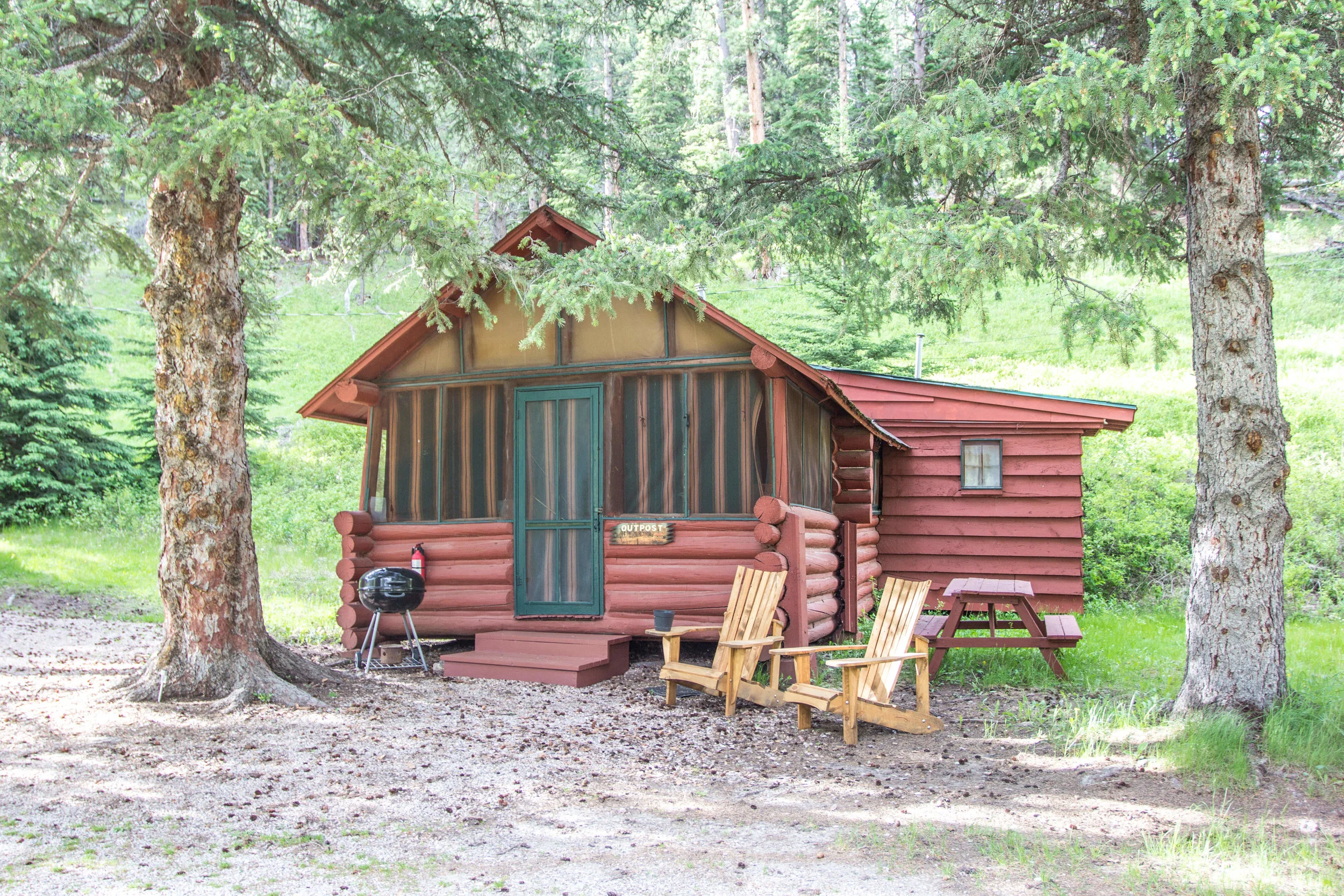 Welcome to Outpost. It is considered a 4 person cabin and has a full bed in the main cabin area and a pair of twins in the sleeping porch. It has a kitchenette with stove top and large fridge, Broadband WIFI - limited, bathroom, gas fireplace for heat, all bed linens, towels and basic cookware. Never miss a morning coffee with a coffee pot, coffee and filters supplied in your cabin. Outside, enjoy a picnic table and charcoal grill. Leave home with food and clothing, Wickiup has the rest. Memorial Day to Labor Day: $120/night Mon-Thurs, $145/night Fri - Sun. Off Season - $105/night Mon - Thurs, $120/night Fri - Sun. Plus a one time cleaning fee of $40. Please call for Sturgis Rally pricing and availability. CLICK TO BOOK NOW!