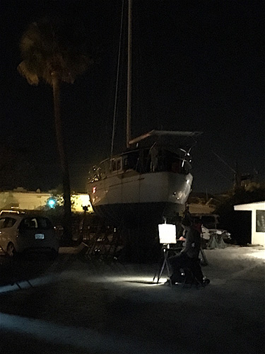 Jason Sacran painting a boatyard nocturne