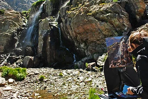 Kathleen B. Hudson painting at Timberline Falls. Photo by John Crandall