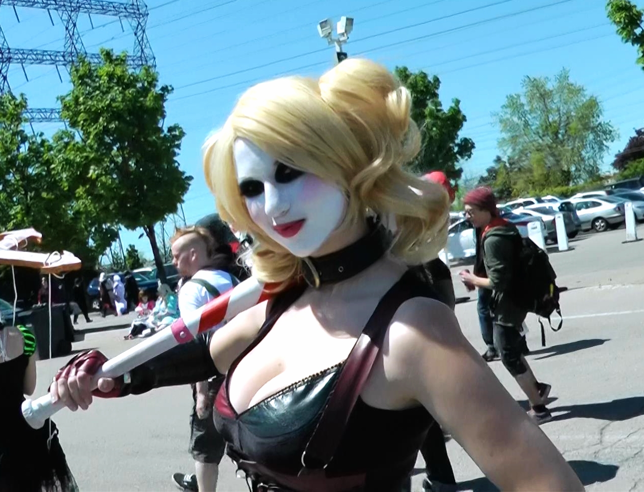 Harley Quinn from DC Comics looks so devious with her matching baseball bat.
