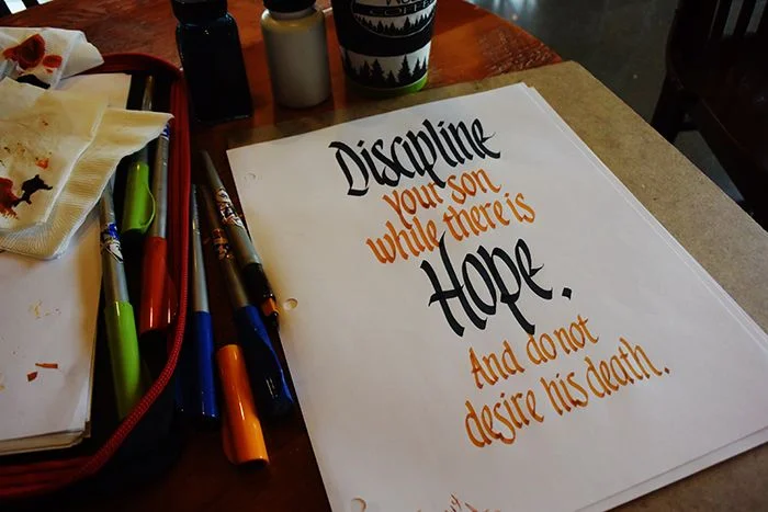 Garman busy at Woods Coffee in Birch Bay, south of Blaine Washington. This proverb raised a couple of eyebrows while I was working on it.