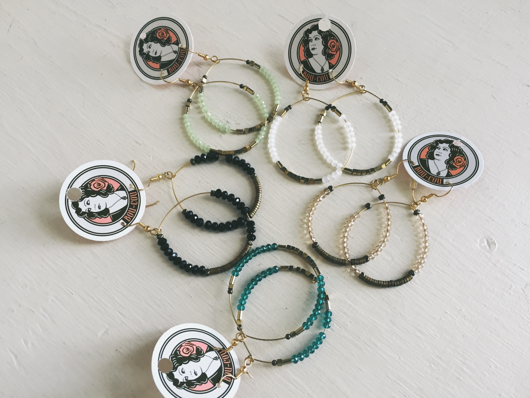 Colorful dangle hoops can take a basic outfit and make it something special!