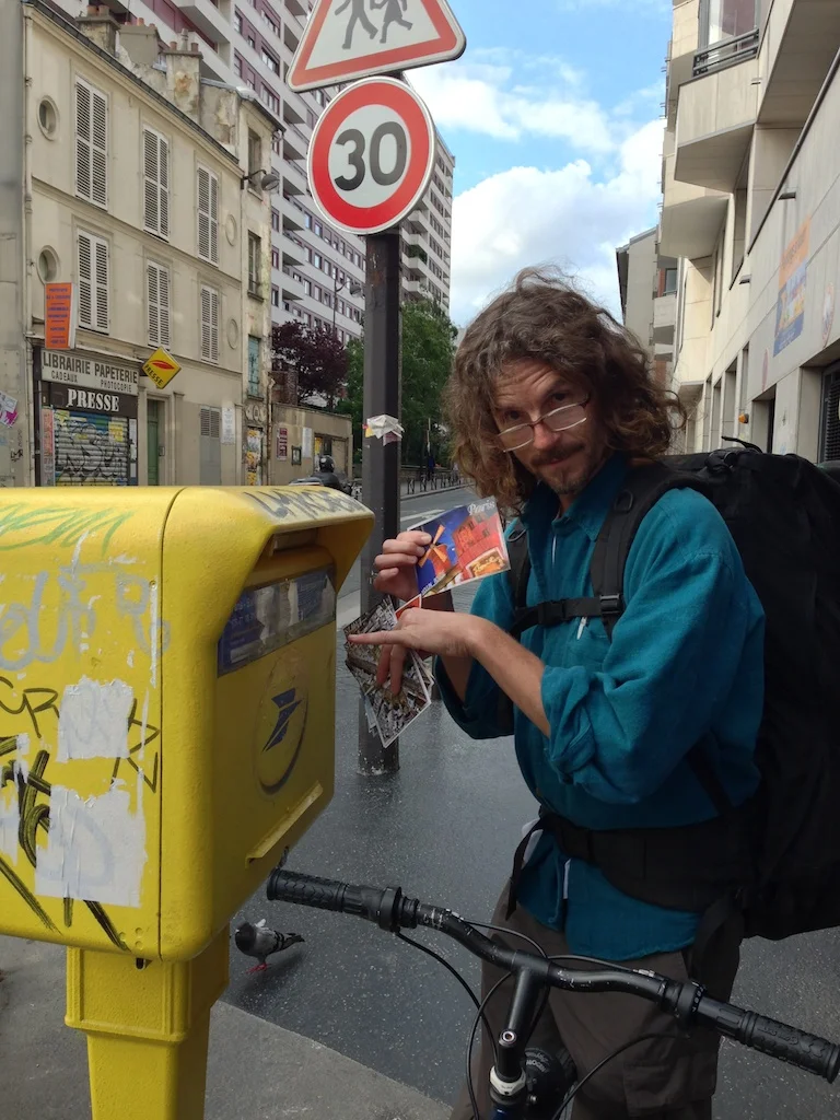 Tony sending postcards from Paris.