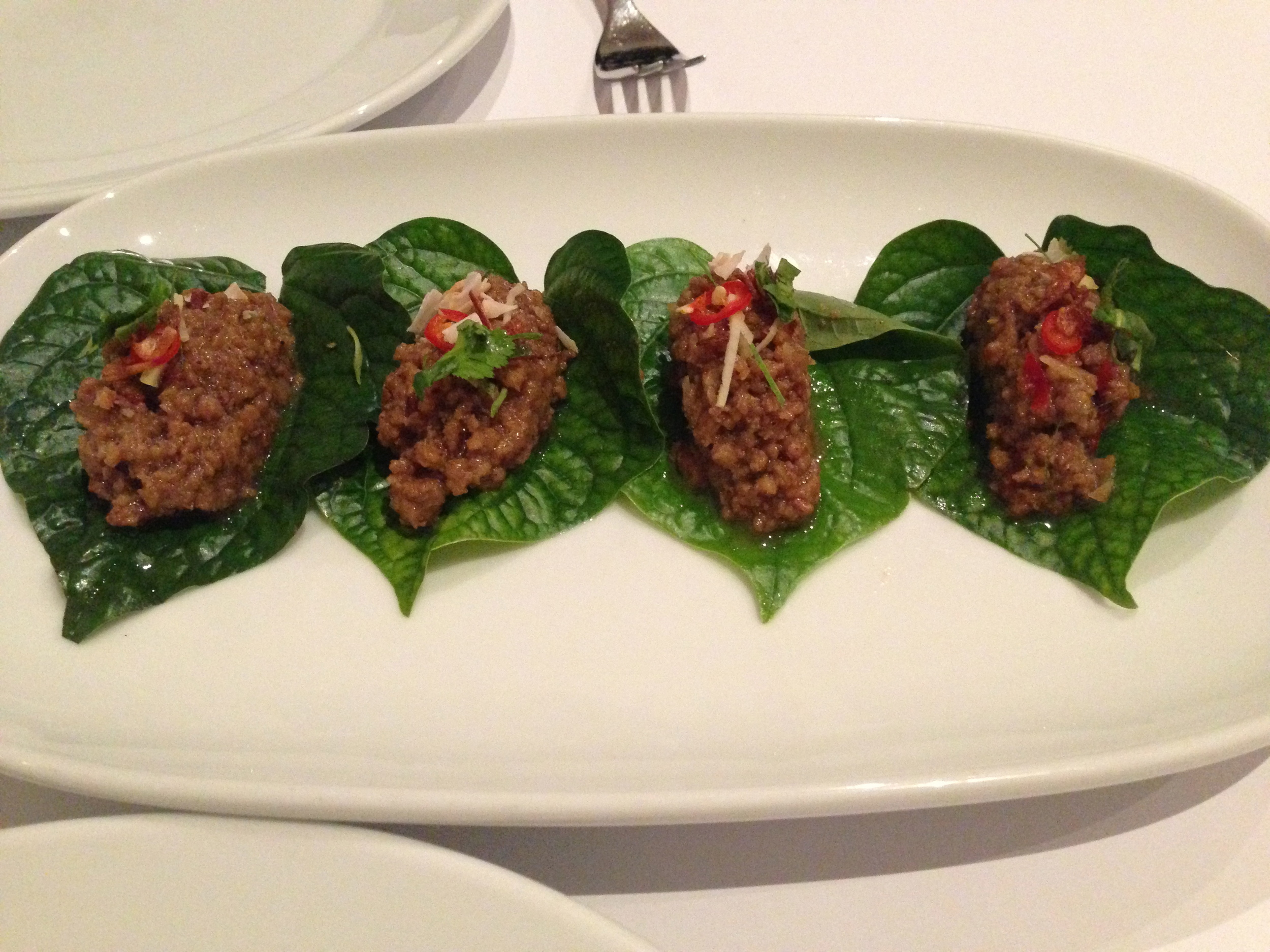 Fresh betel leaves with
sticky caramelised pork and incendiary components. 






  
  
   
  
  

  
  
   Normal 
   0 
   
   
   
   
   false 
   false 
   false 
   
   EN-AU 
   JA 
   X-NONE 
   
    
    
    
    
    
    
    
    
    
    
   
   
    
    
    
    
    
    
    
    
    
    
    
    
    
  
   
   
   
   
   
   
   
   
   
   
   
   
   
   
   
   
   
   
   
   
   
   
   
   
   
   
   
   
   
   
   
   
   
   
   
   
   
   
   
   
   
   
   
   
   
   
   
   
   
   
   
   
   
   
   
   
   
   
   
   
   
   
   
   
   
   
   
   
   
   
   
   
   
   
   
   
   
   
   
   
   
   
   
   
   
   
   
   
   
   
   
   
   
   
   
   
   
   
   
   
   
   
   
   
   
   
   
   
   
   
   
   
   
   
   
   
   
   
   
   
   
   
   
   
   
   
   
   
   
   
   
   
   
   
   
   
   
  
  

 
 
 /* Style Definitions */
table.MsoNormalTable
	{mso-style-name:"Table Normal";
	mso-tstyle-rowband-size:0;
	mso-tstyle-colband-size:0;
	mso-style-noshow:yes;
	mso-style-priority:99;
	mso-style-parent:"";
	mso-padding-alt:0cm 5.4pt 0cm 5.4pt;
	mso-para-margin:0cm;
	mso-para-margin-bottom:.0001pt;
	mso-pagination:widow-orphan;
	font-size:10.0pt;
	font-family:Cambria;}