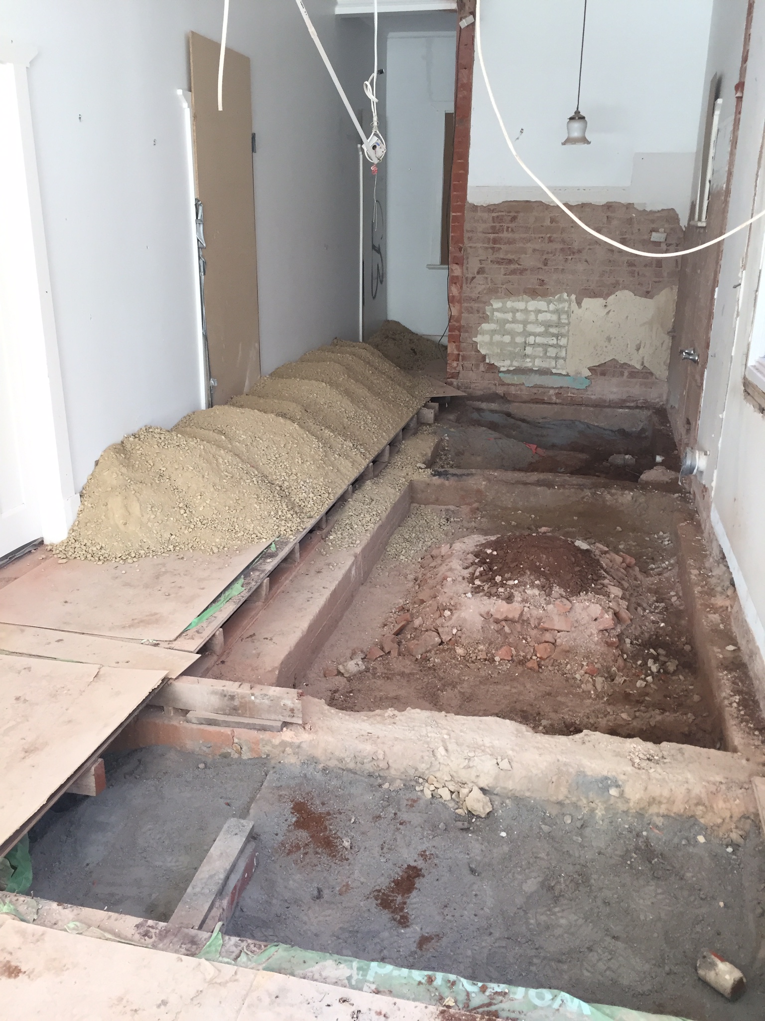 Digging down to replace the pipework for the new bathroom and laundry
