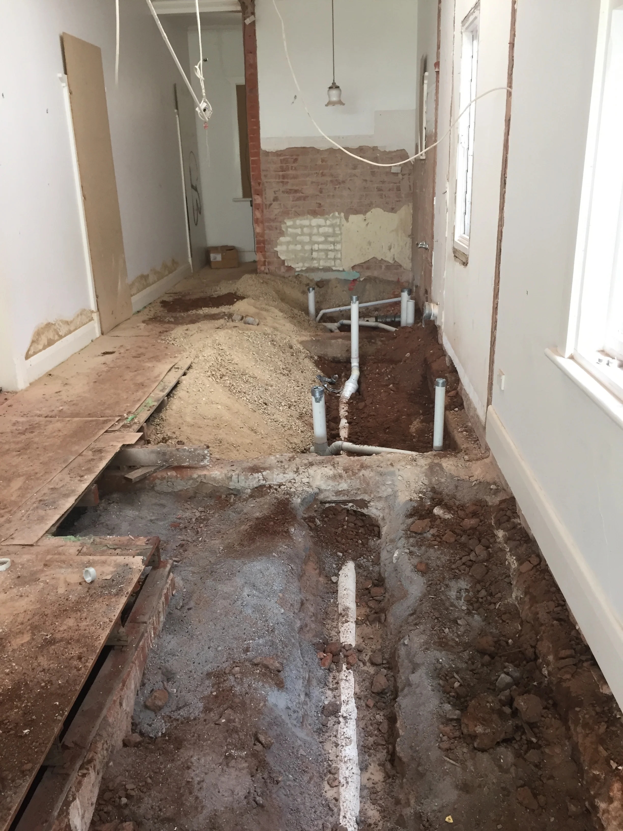 New pipework in the laundry and main bathroom.