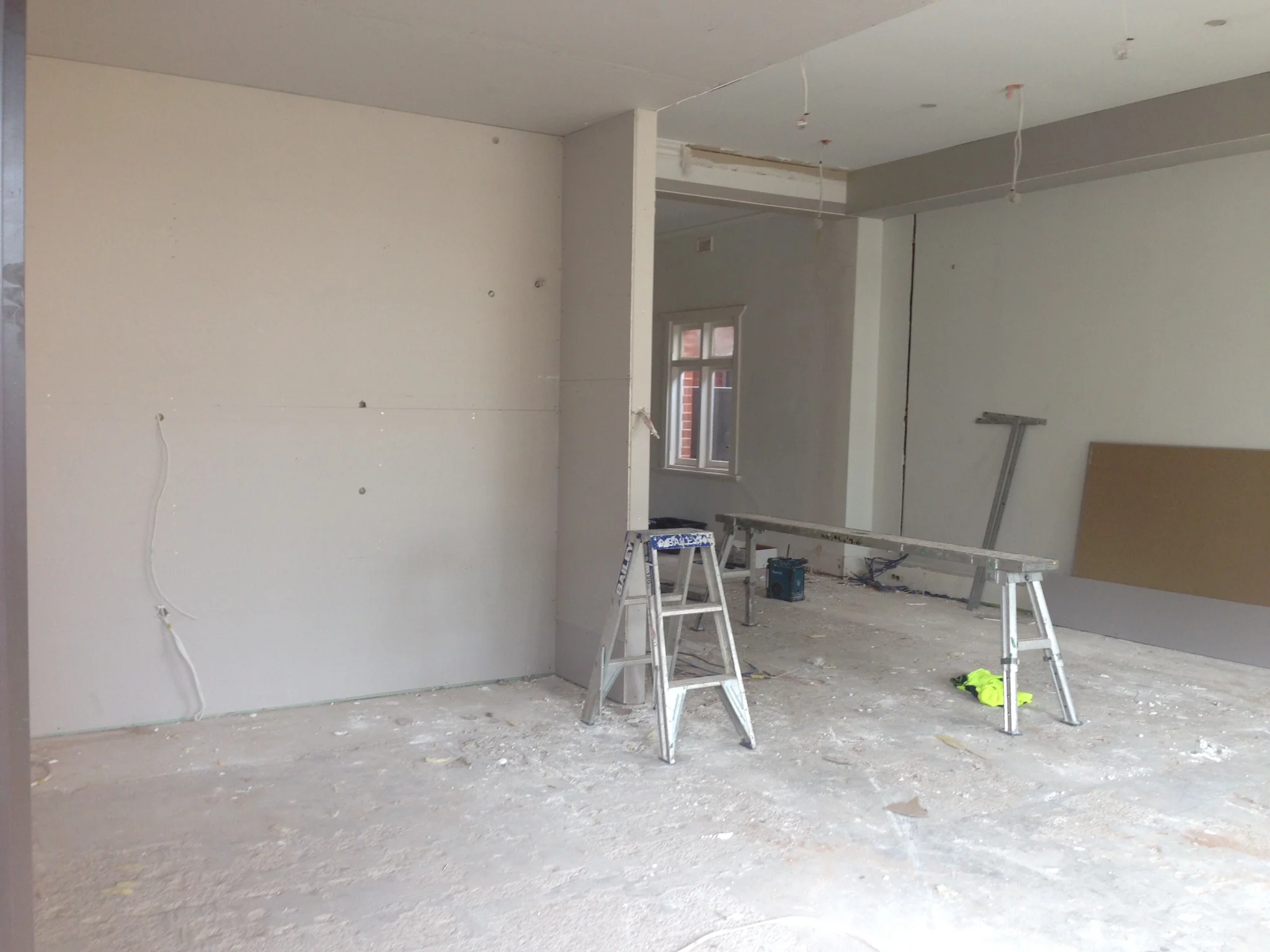 Plasterboard in the kitchen looking towards living area.