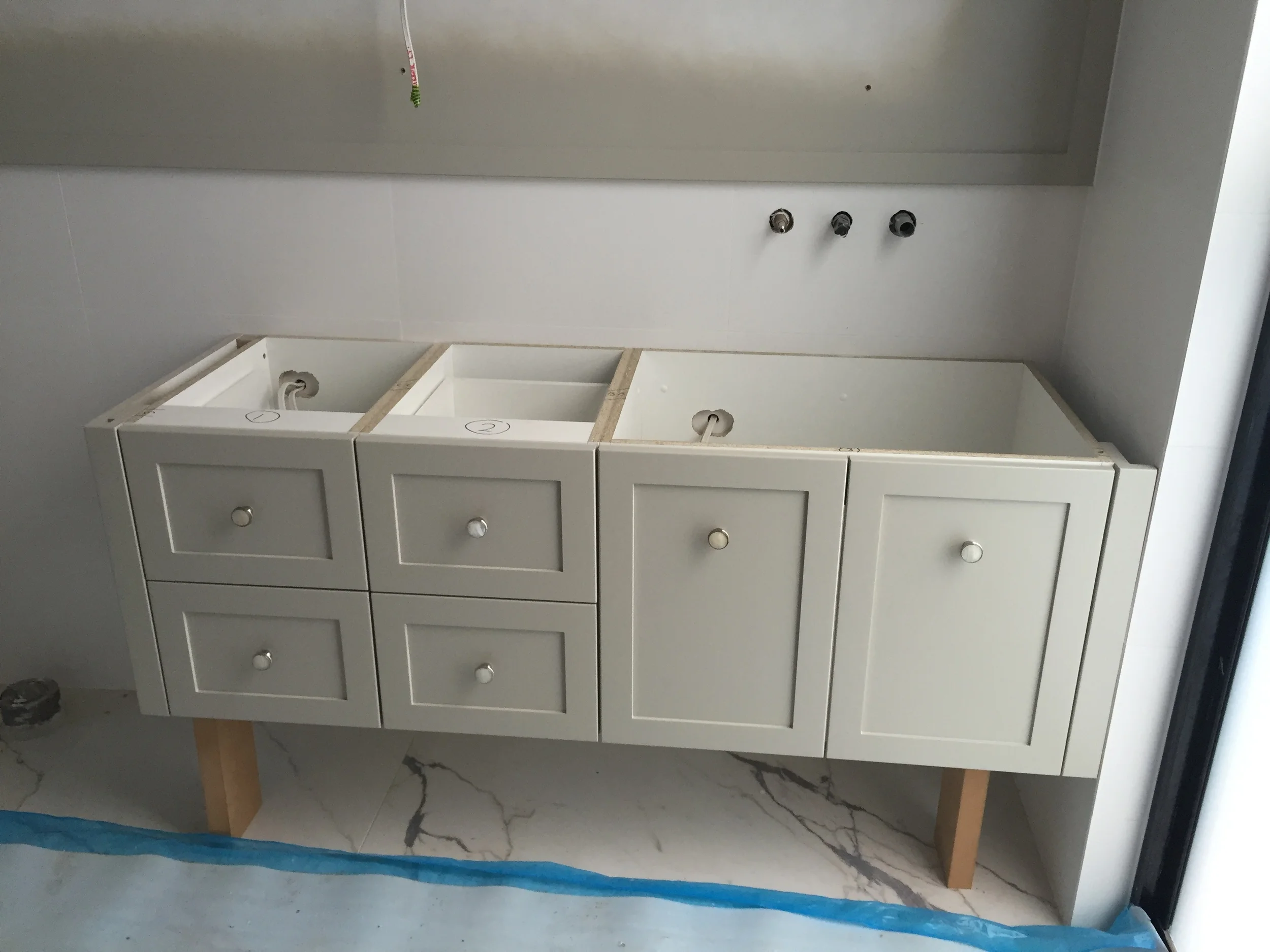Ensuite vanity with the divine mother of pearl handles.