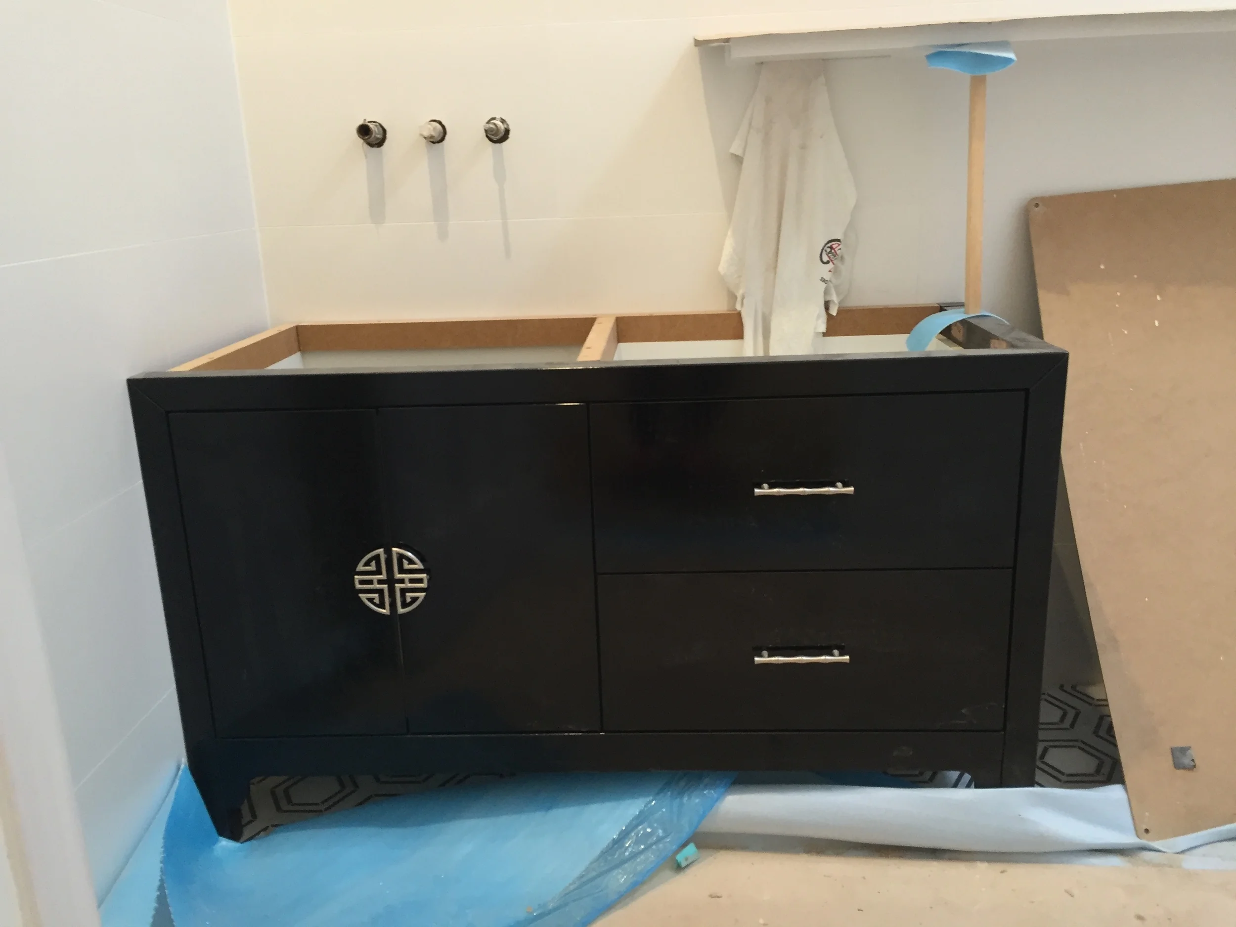The main bathroom vanity - looking forward to seeing it with the white stone top and basin.