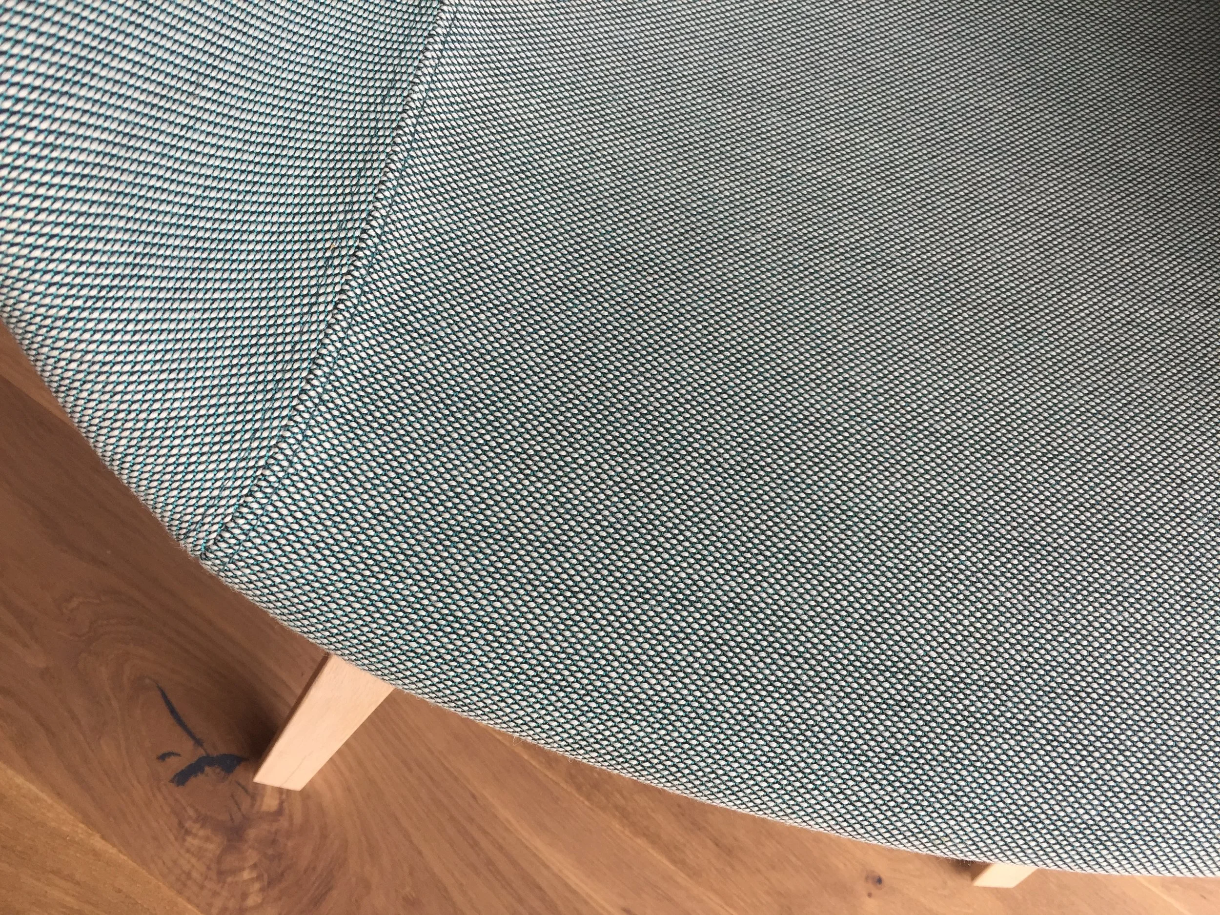 Hay About A Chair beech legs with seat covered in Kvadrat Steelcut Trio in teal blue.