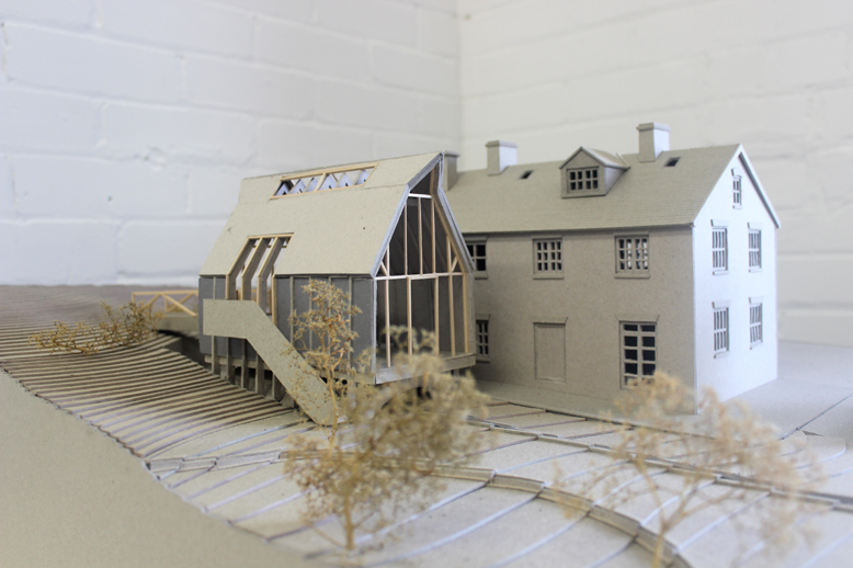 Birdseye Photo of Model Showing Proposed Extension