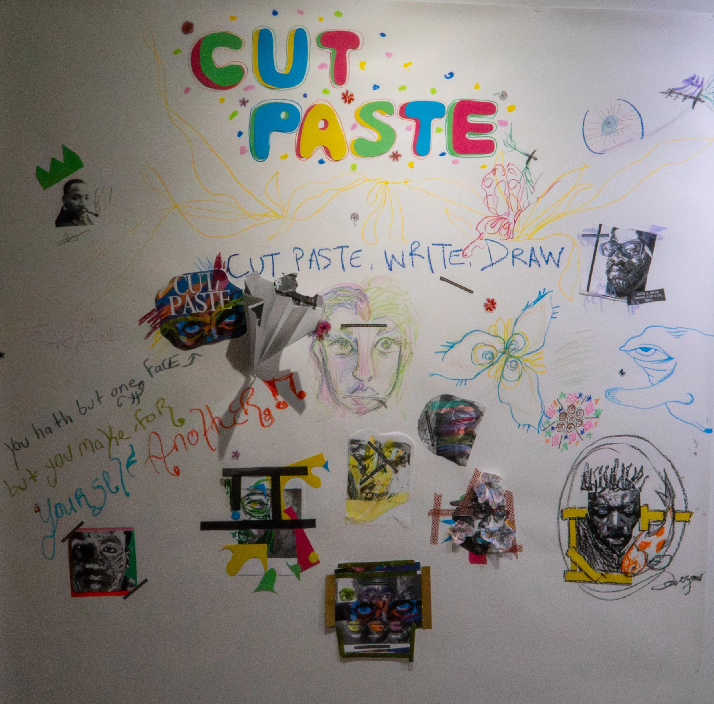 Activity wall where patrons cut and paste and asssembled something new. 
