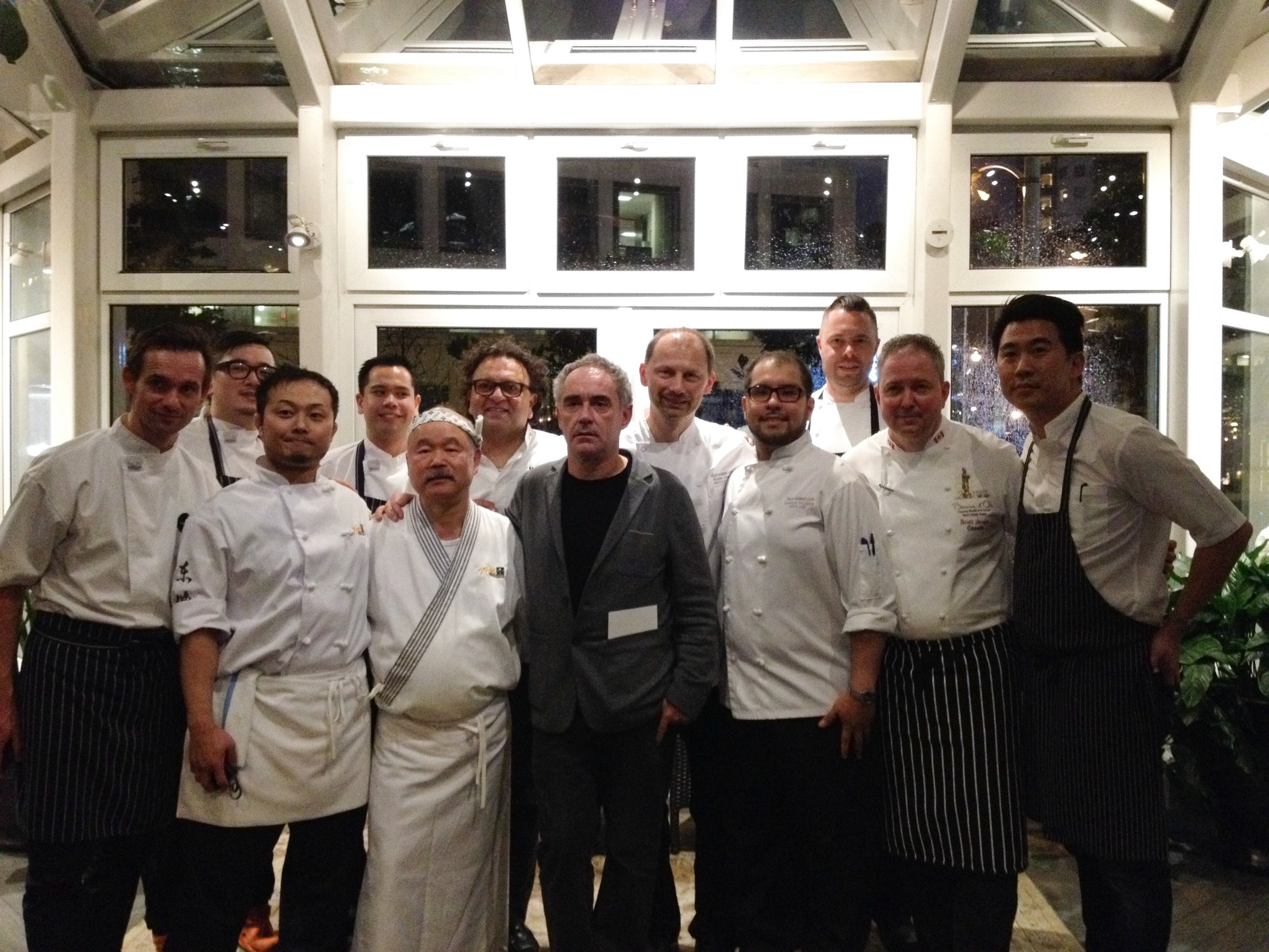 Some Vancouver chefs and their assistants with Ferran Adria, middle, on his Vancouver visit. Front row, from left, Thomas Haas, Masa Baba, Tojo Hidekazu, Adria, Ricardo Valverde, Scott Jaeger, Angus An; back row, from left, Lovett Sheng, Elmo Pinpin, Vikram Vij, Frank Pabst and Sean Cousin. Photo by Bethany Leng