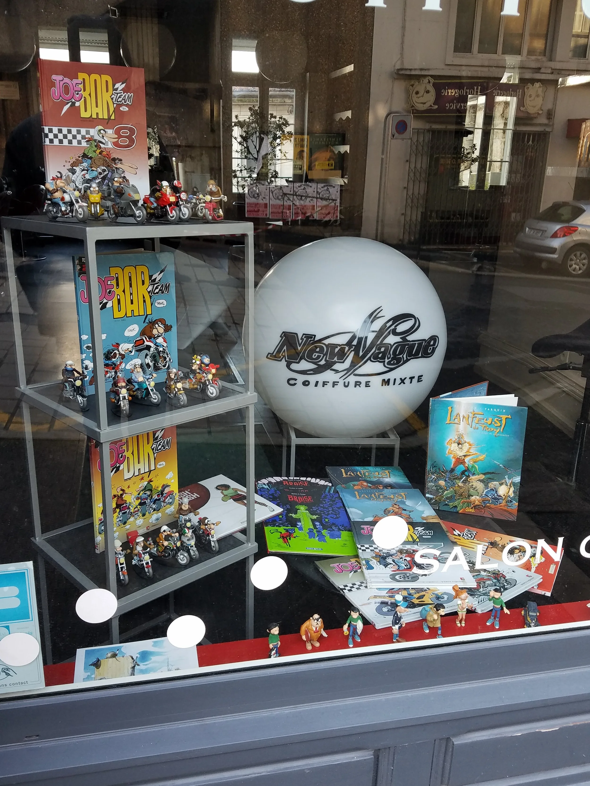 The window of a hair salon.