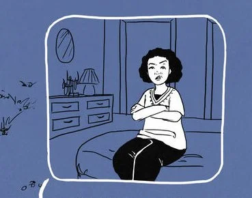 A blue and white drawing of a girl sitting on her bed with her arms crossed.