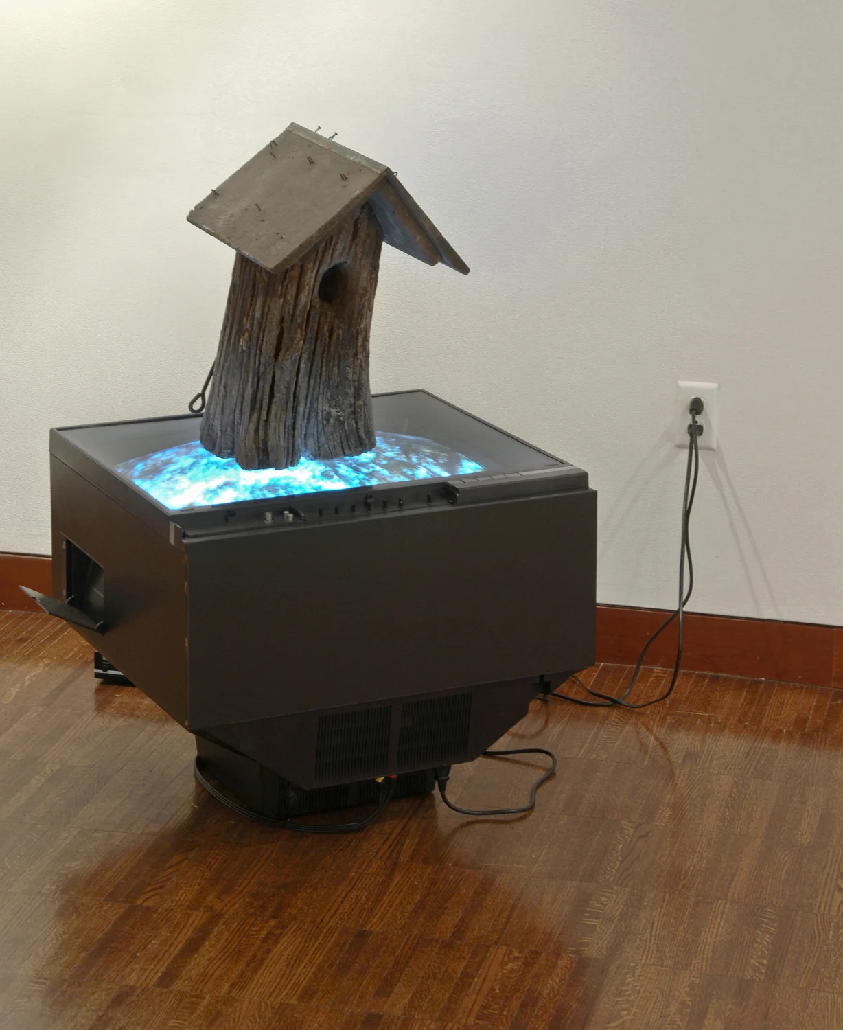 “Untitled”, found object (bird house), television, video, 41 x 25 x 23 inches, 2007