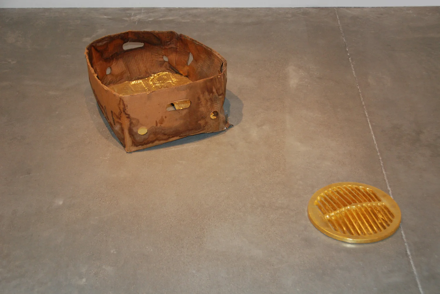 Untitled - collaborative sculpture made with Candace Black, plaster, found object, gold leaf, installation view, Urban Arts Space, 2012.jpg
