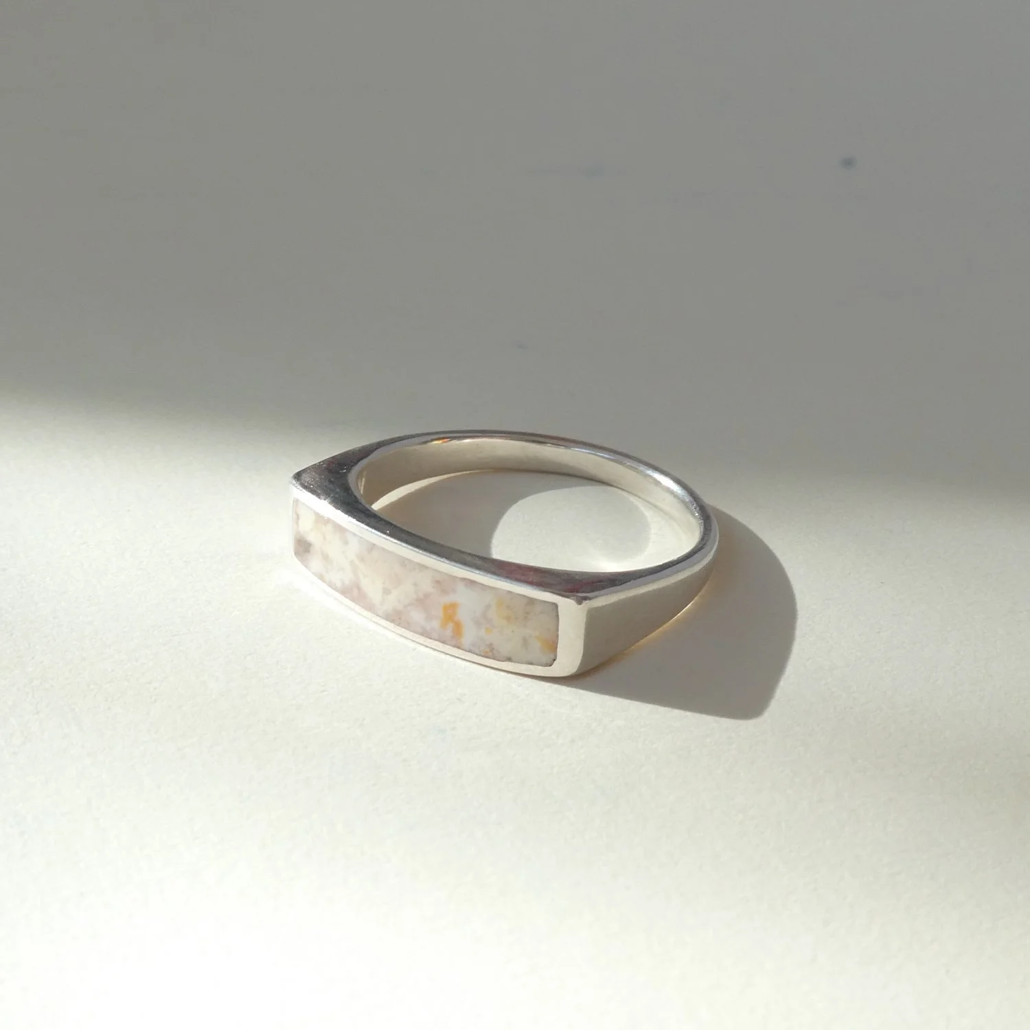 curved band plume agate inlay.JPG