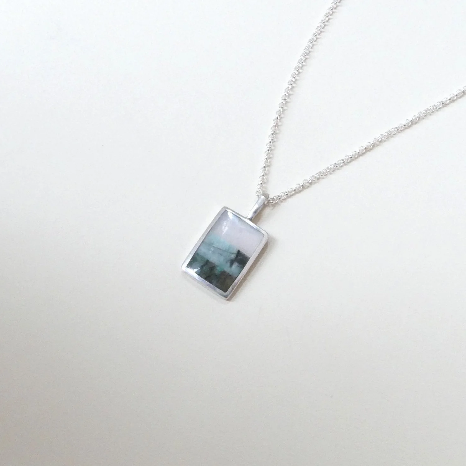 small rectangle pendant multi stone.JPG